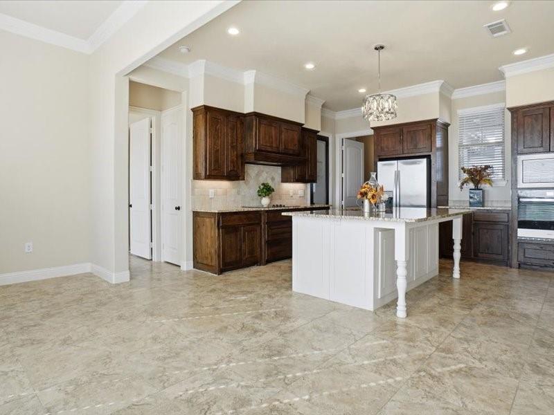 4021 West J E Woody Road Springtown, TX 76082 - Photo 11 of 37 View of kitchen from breakfast area