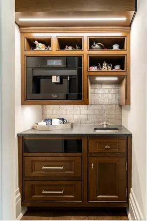 a bathroom with a stove and a microwave