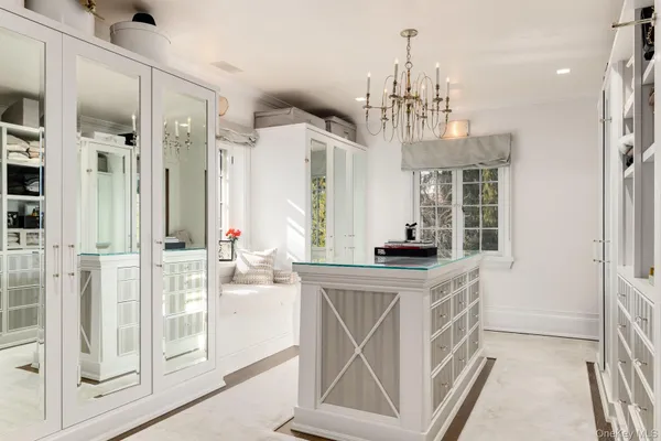 a very nice looking kitchen with a chandelier