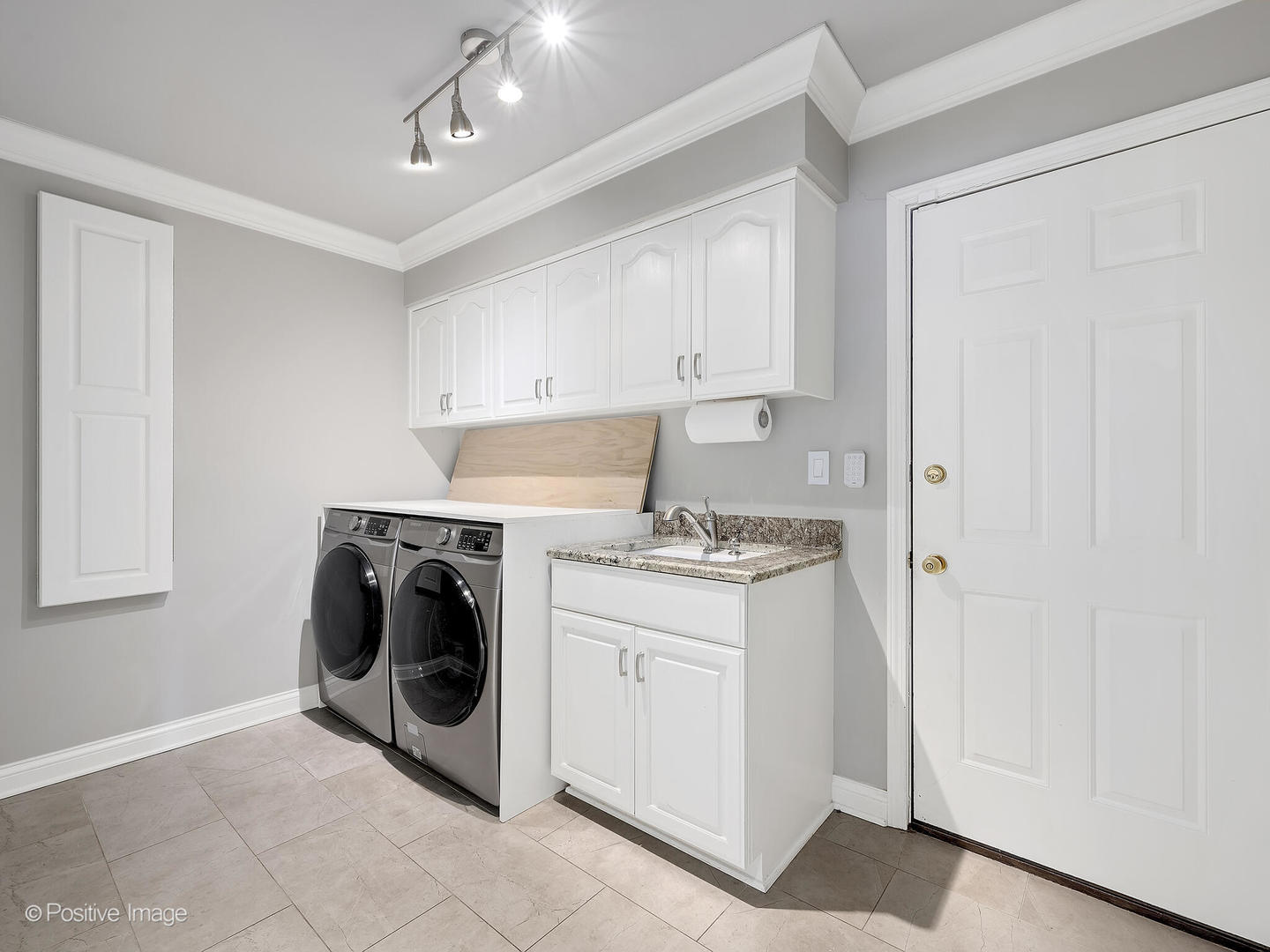 8151 Lake Ridge Drive Burr Ridge, IL 60527 - Photo 19 of 46 a utility room with dryer and washer
