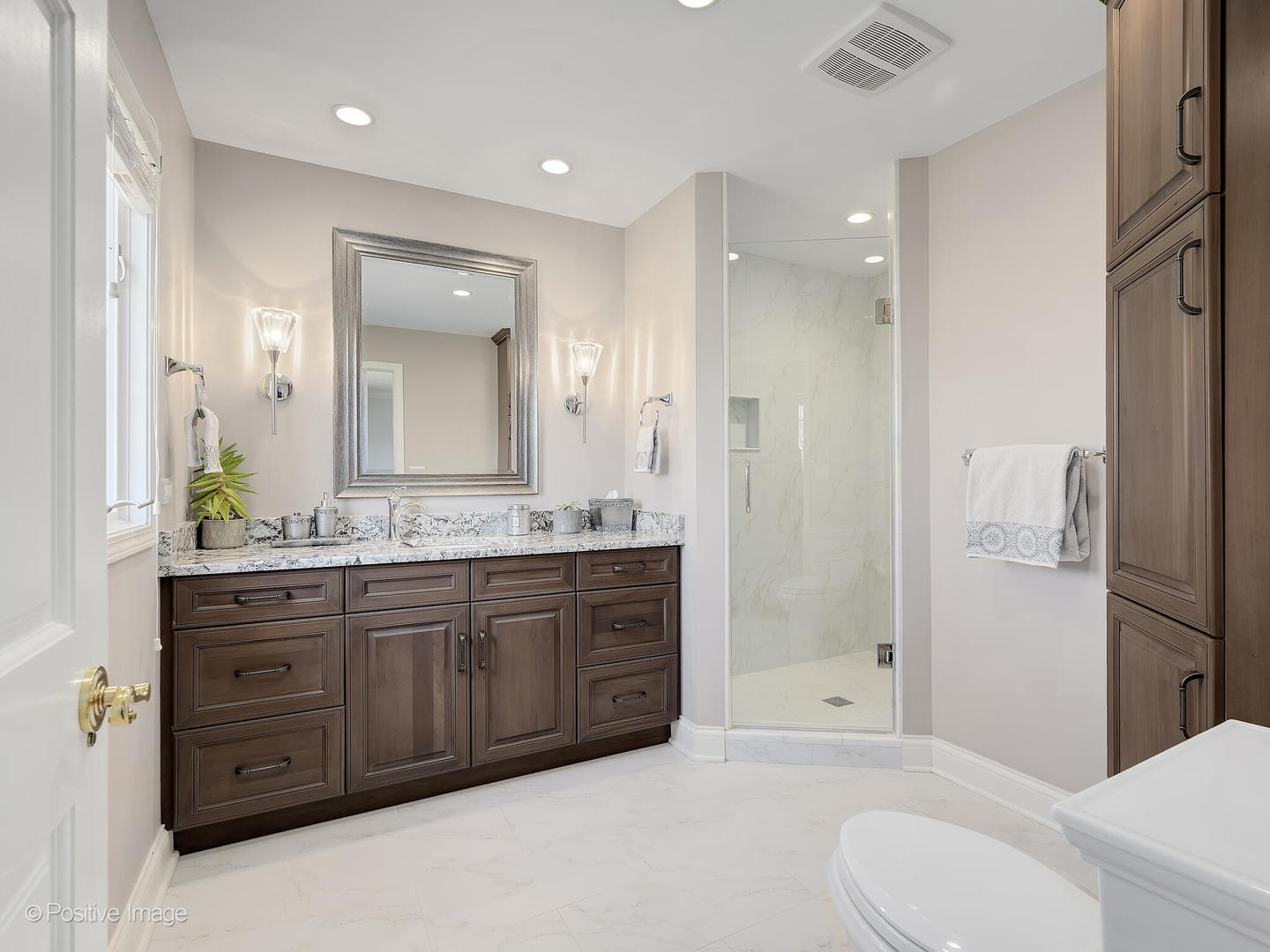 8151 Lake Ridge Drive Burr Ridge, IL 60527 - Photo 25 of 46 a spacious bathroom with a bathtub shower sink mirror and toilet