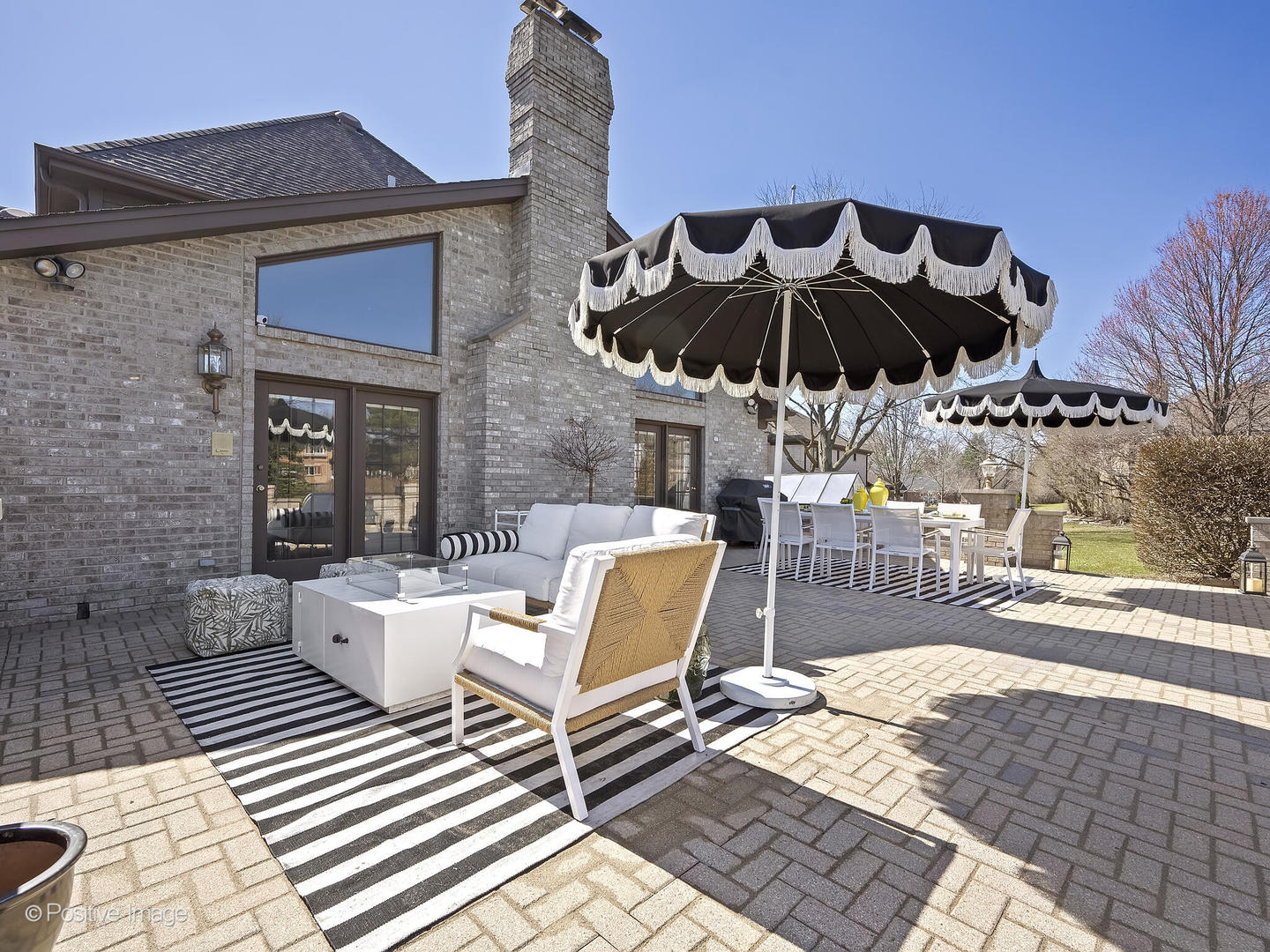 8151 Lake Ridge Drive Burr Ridge, IL 60527 - Photo 36 of 46 a view of a patio with a table and chairs