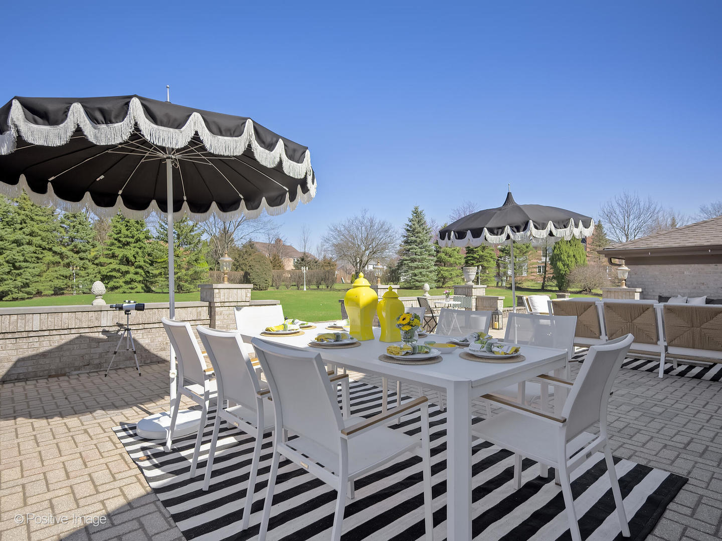 8151 Lake Ridge Drive Burr Ridge, IL 60527 - Photo 39 of 46 a view of a patio with table and chairs potted plants with wooden floor