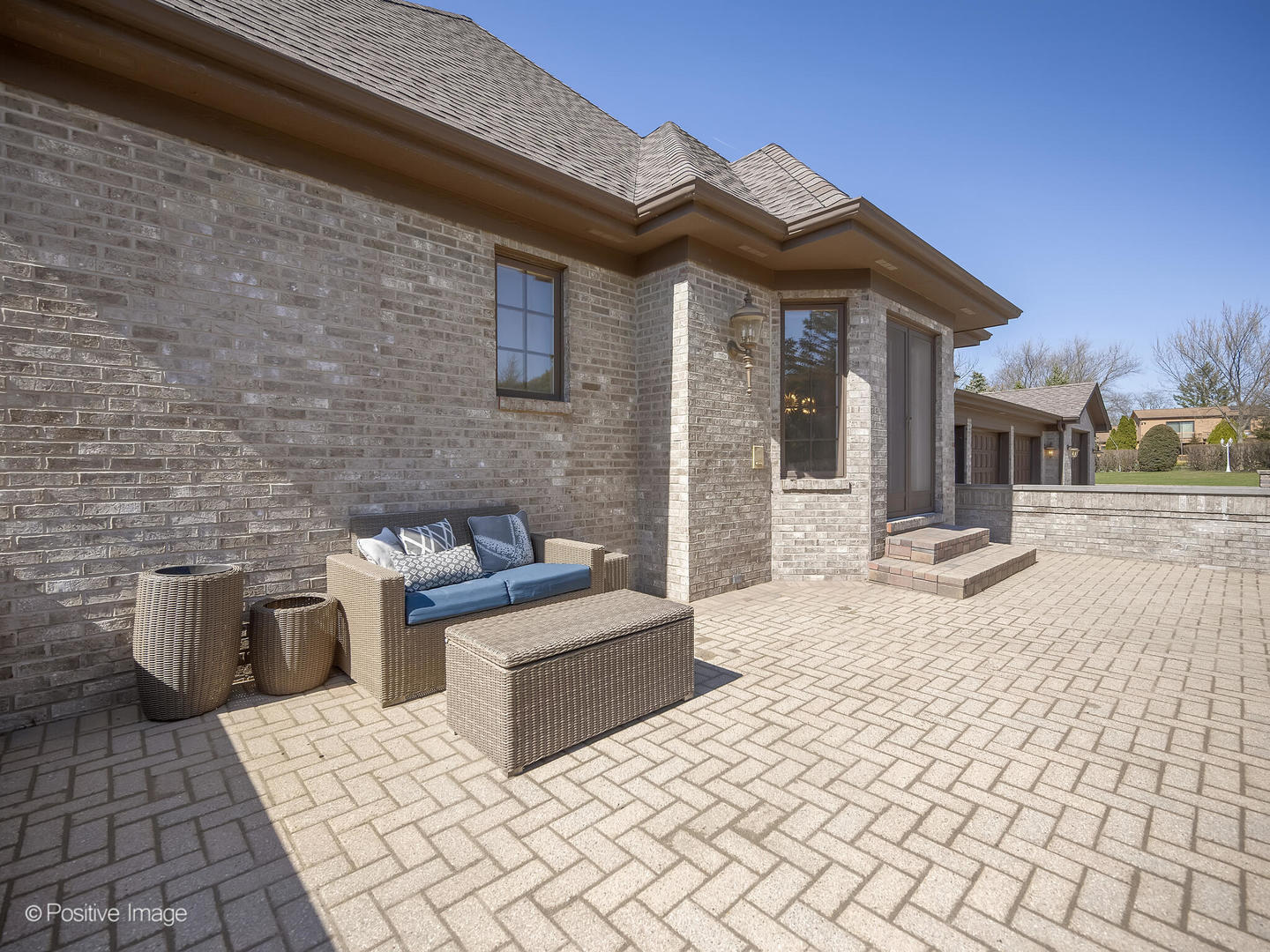 8151 Lake Ridge Drive Burr Ridge, IL 60527 - Photo 41 of 46 a view of a patio with table and chairs