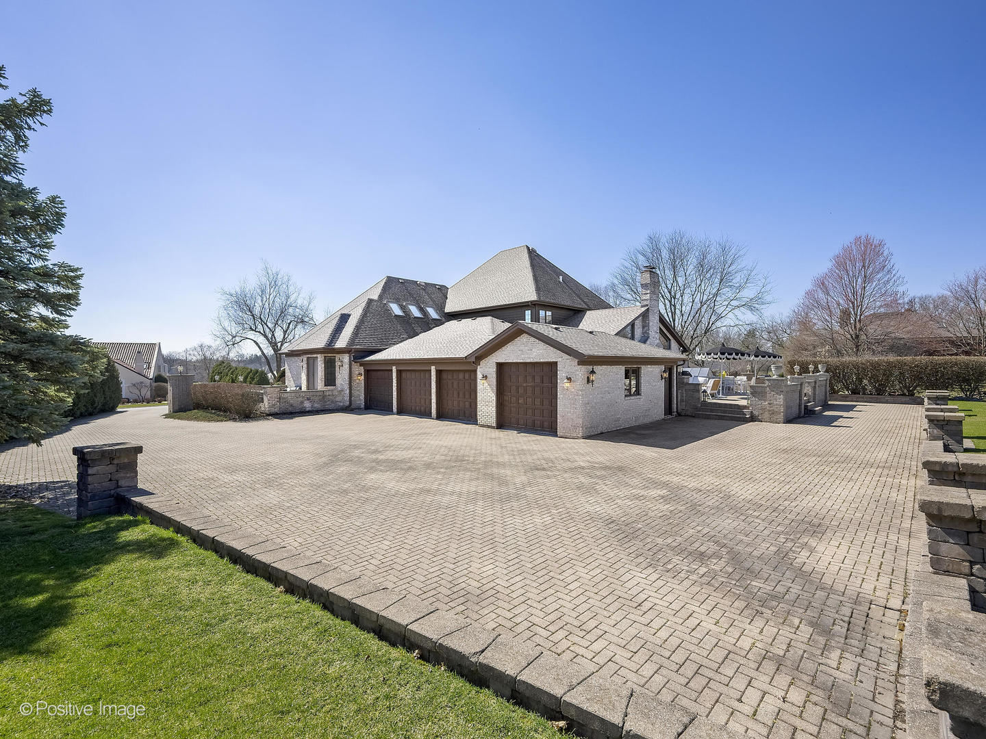 8151 Lake Ridge Drive Burr Ridge, IL 60527 - Photo 46 of 46 a front view of a house with a yard