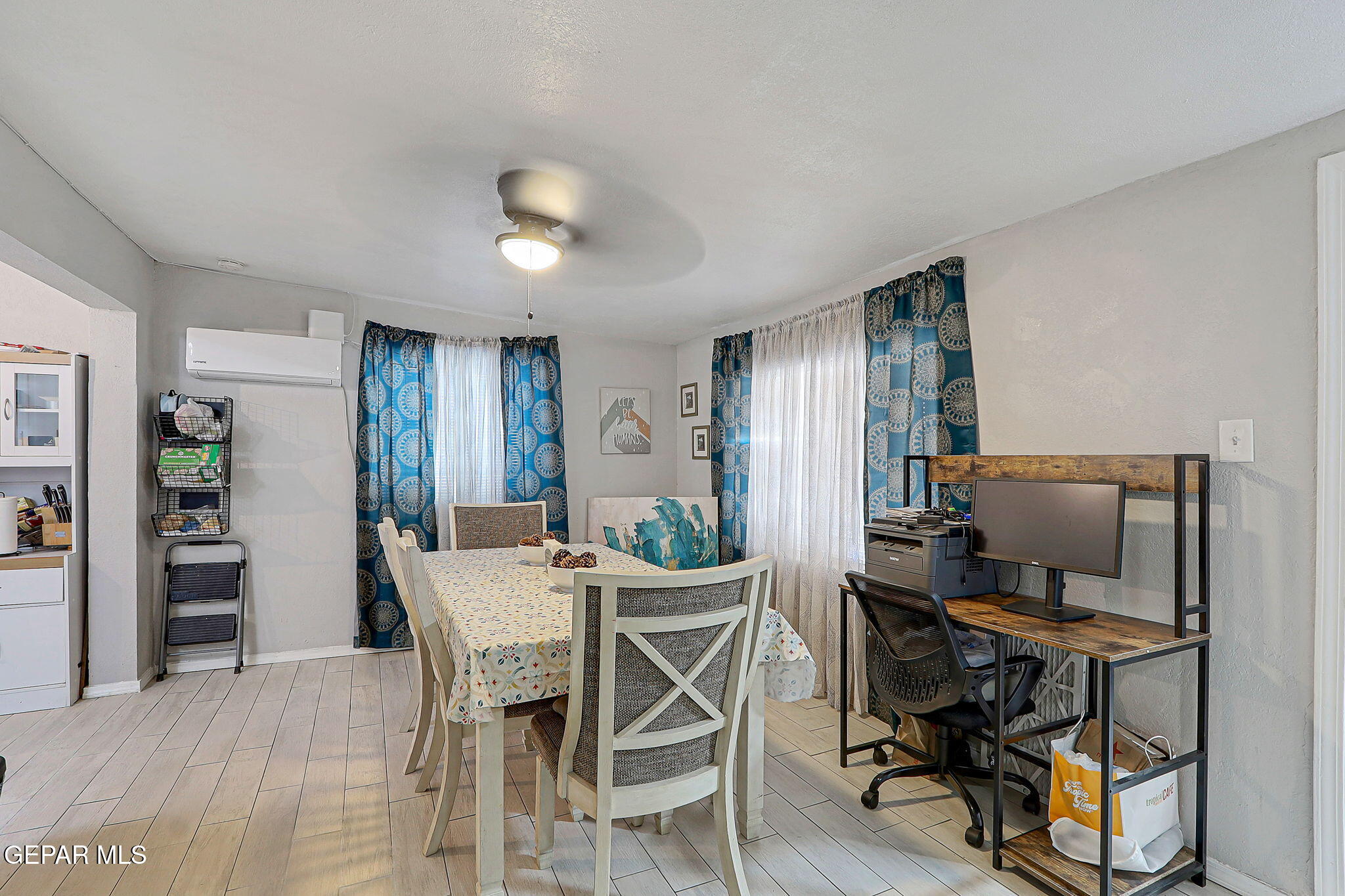 8339 White Road El Paso, TX 79907 - Photo 22 of 31 a view of a dining room with furniture and window