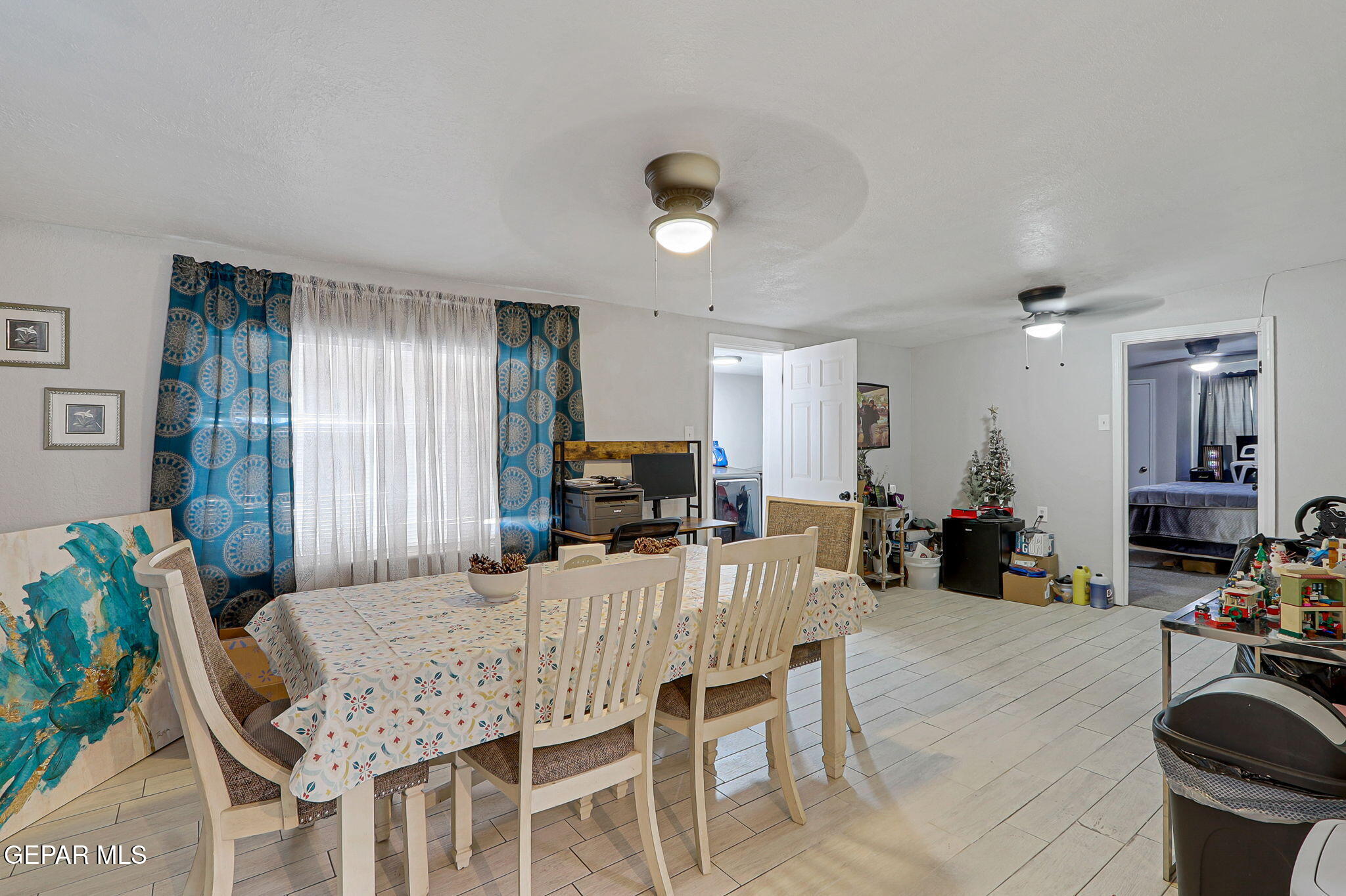 8339 White Road El Paso, TX 79907 - Photo 23 of 31 a view of a dining room with furniture