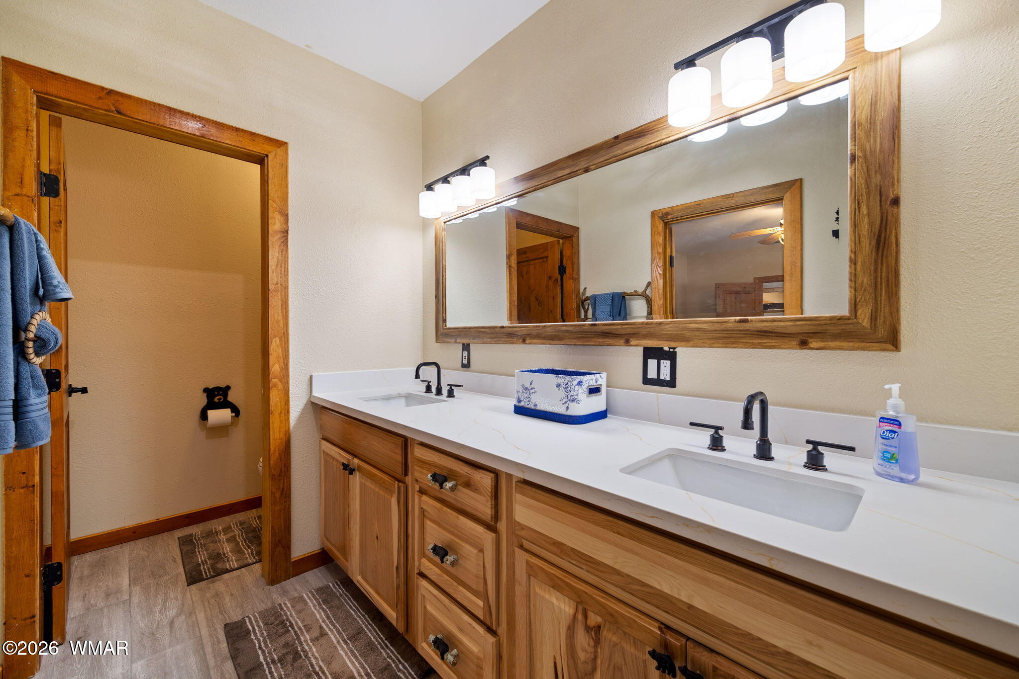 2924 Pine Rim Road Overgaard, AZ 85933 - Photo 25 of 43 a bathroom with a double vanity sink mirror and double