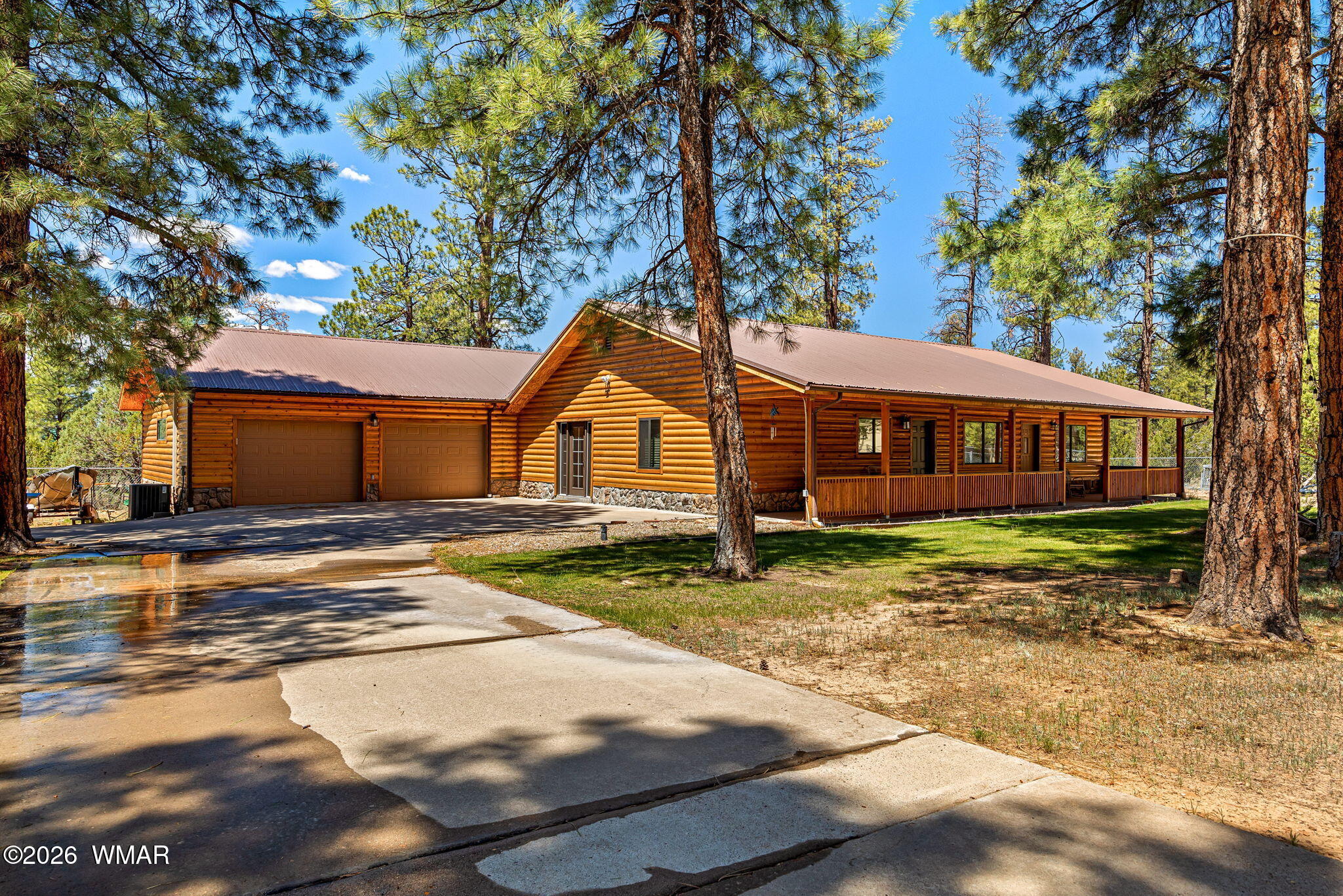 2924 Pine Rim Road Overgaard, AZ 85933 - Photo 4 of 43 a view of a house with a yard