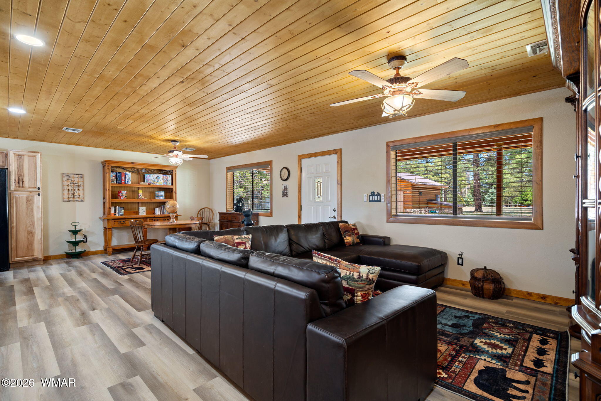 2924 Pine Rim Road Overgaard, AZ 85933 - Photo 8 of 43 a living room with furniture and a window