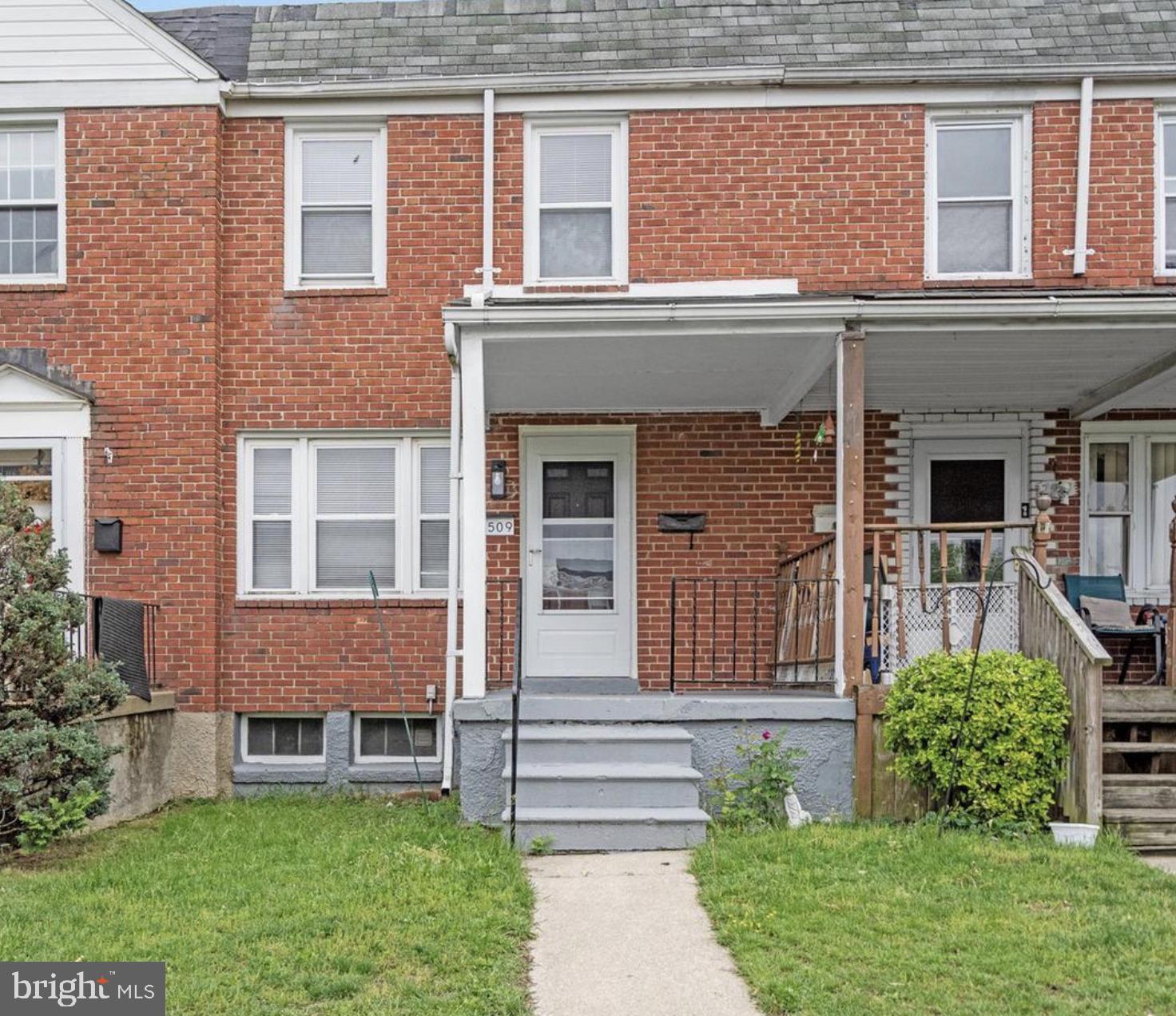 7509 Durwood Road Baltimore, MD 21222 - Photo 2 of 24 a front view of a house with garden