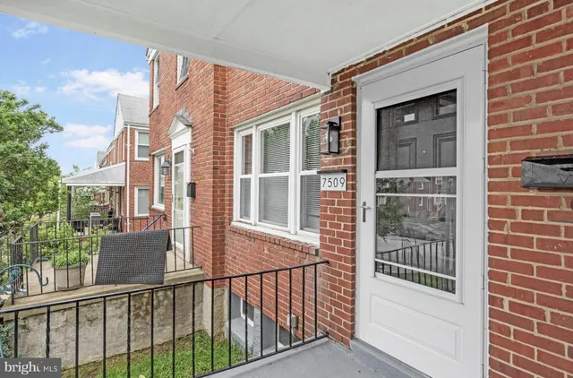 a view of a house with a glass door