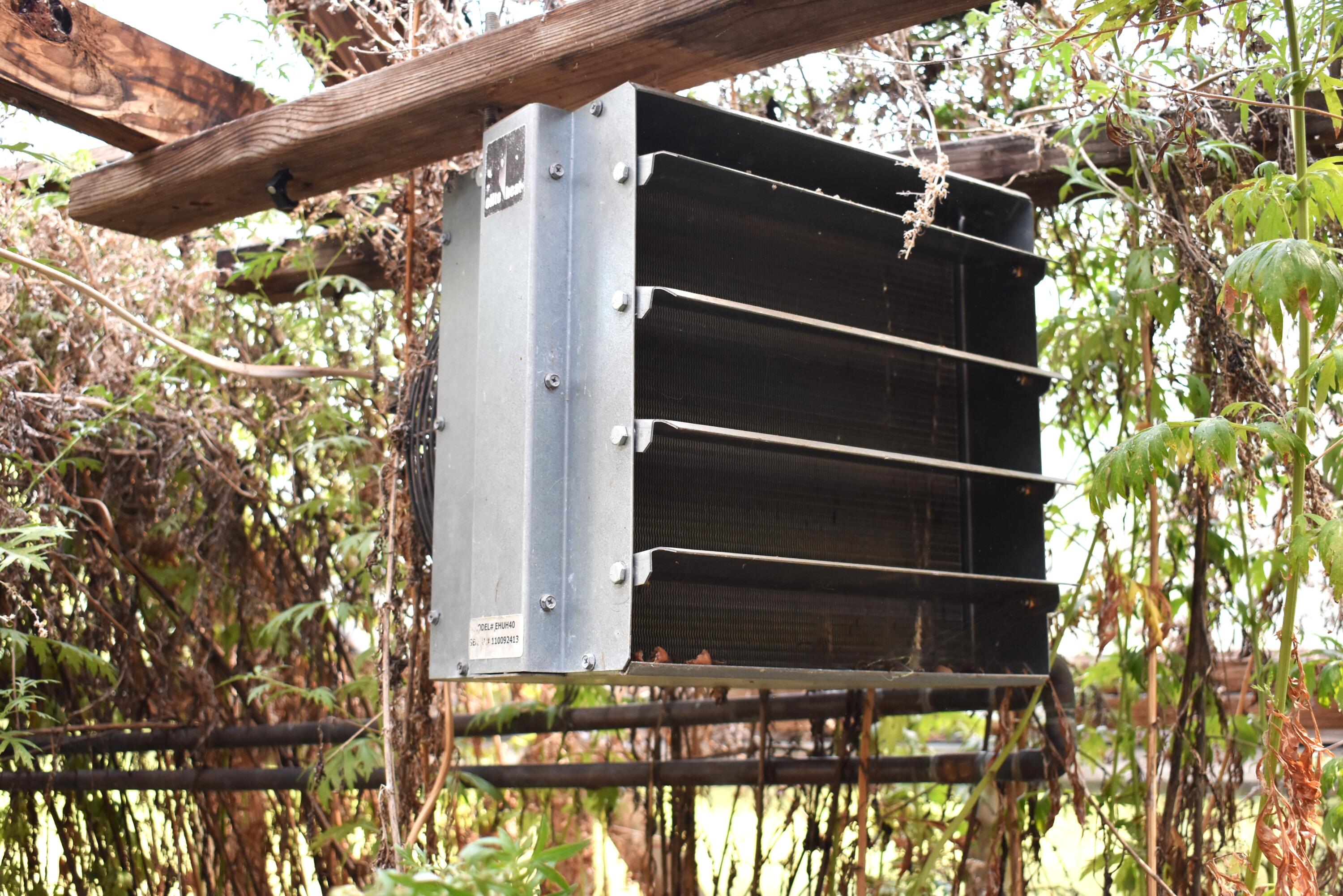 8275 Rough Road Atlanta, MI 49709 - Photo 31 of 37 Heater in Green House