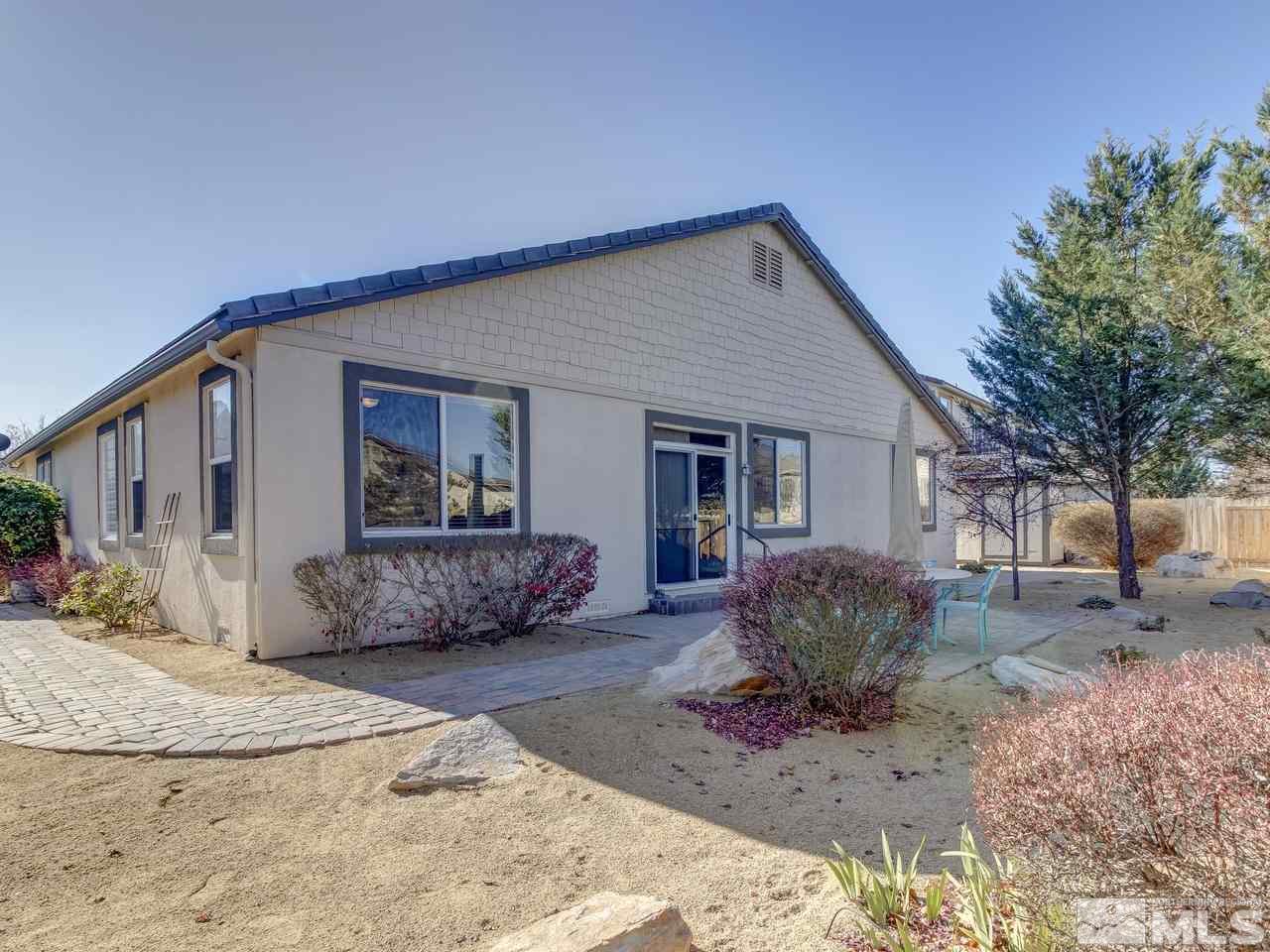 10803 Rushing Flume Drive Reno, NV 89521 - Photo 20 of 22 a front view of a house with a couch