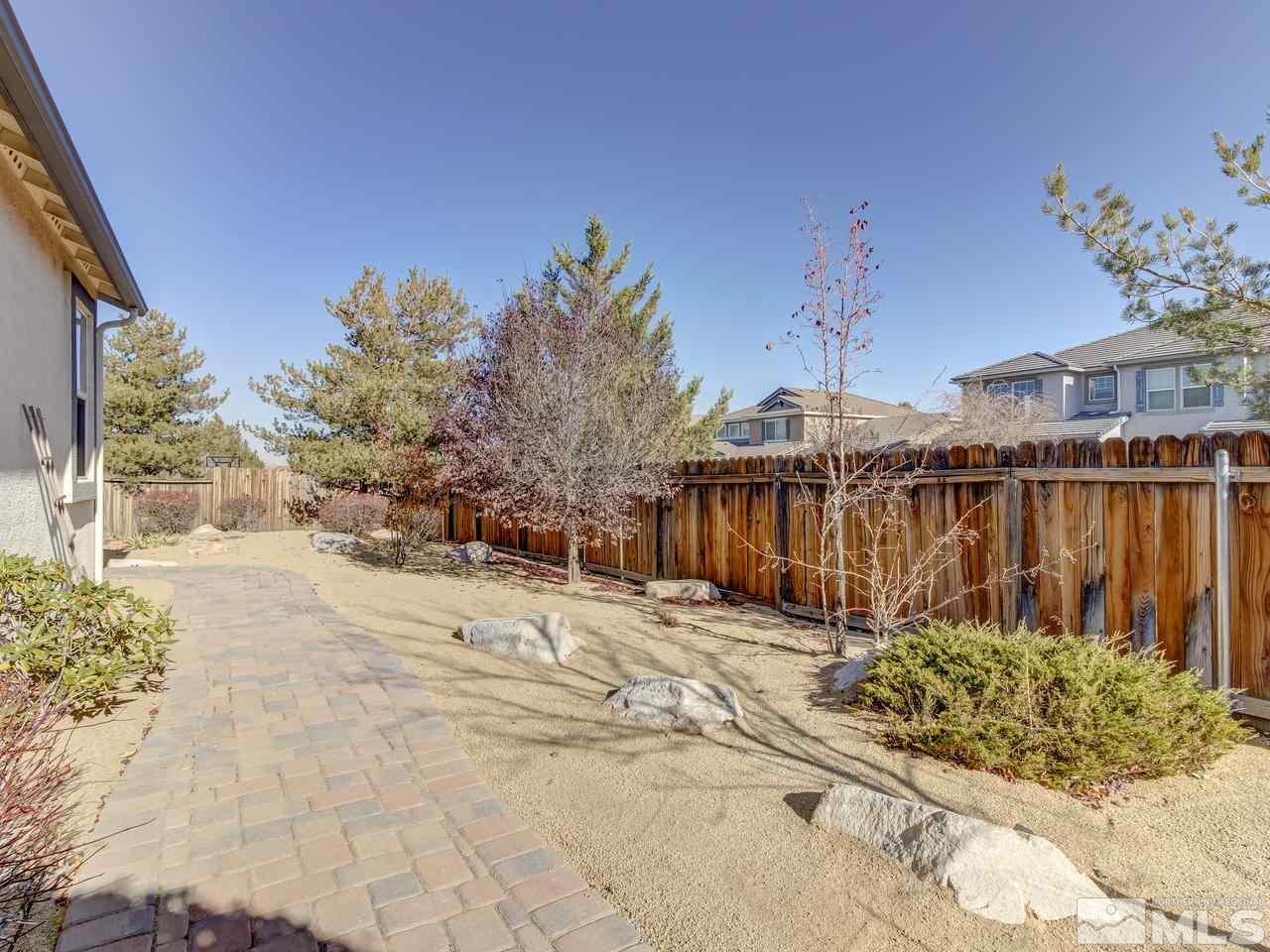 10803 Rushing Flume Drive Reno, NV 89521 - Photo 21 of 22 a view of a backyard of the house