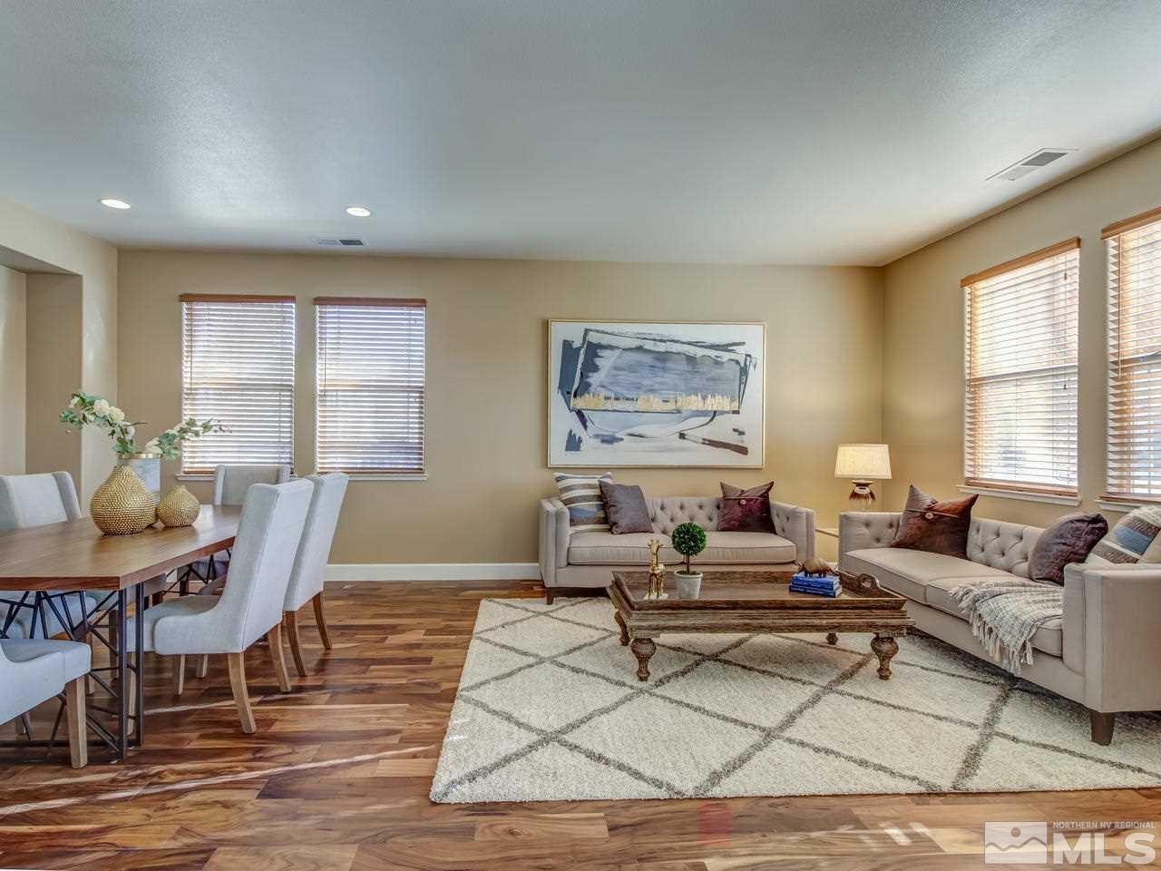10803 Rushing Flume Drive Reno, NV 89521 - Photo 4 of 22 a living room with furniture and a window