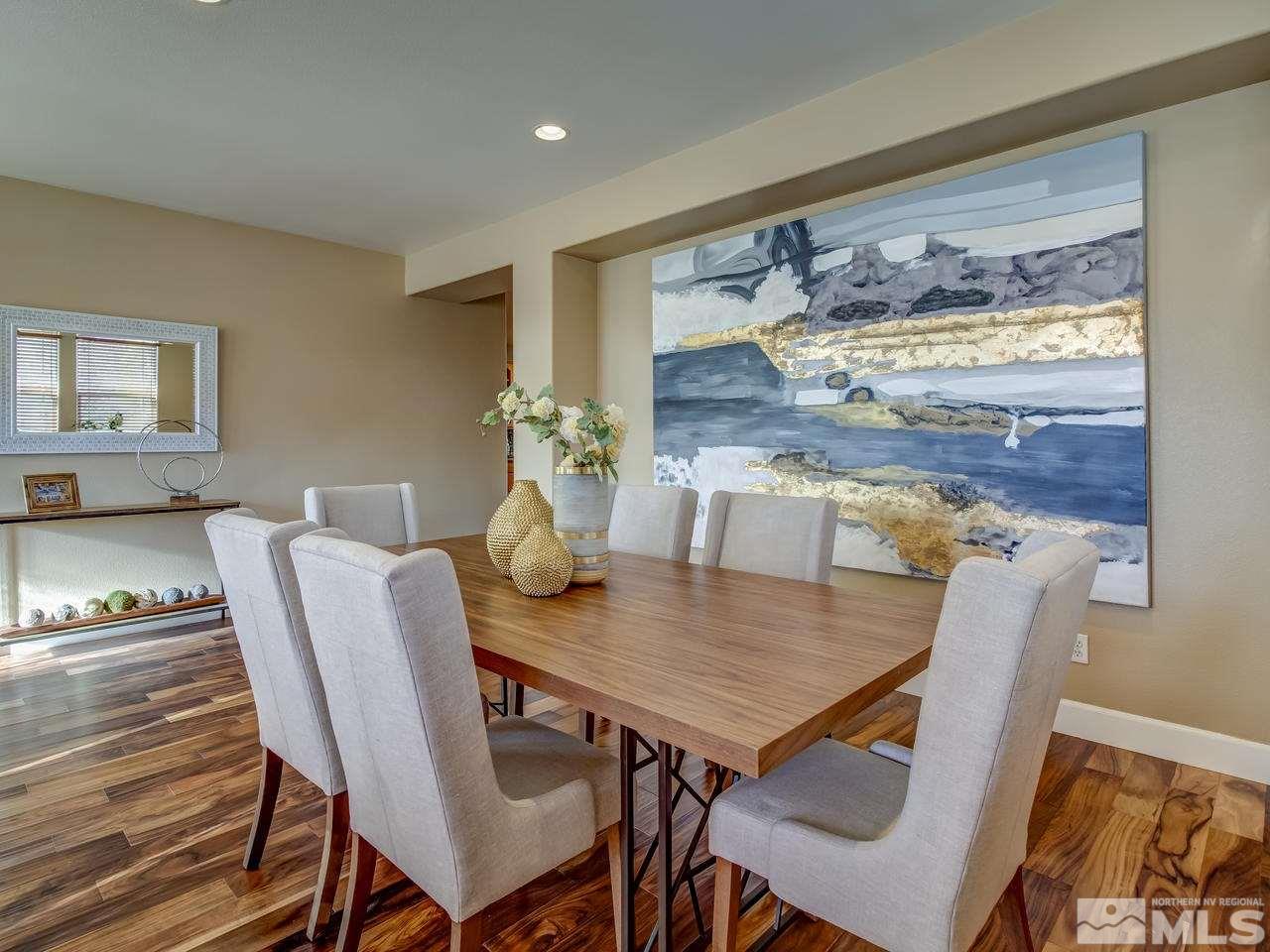 10803 Rushing Flume Drive Reno, NV 89521 - Photo 6 of 22 a view of a dining room with furniture window and outside view