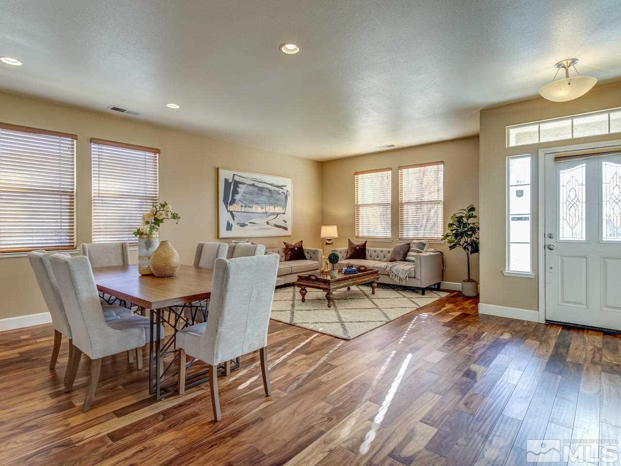 10803 Rushing Flume Drive Reno, NV 89521 - Photo 7 of 22 a living room with furniture a window and wooden floor