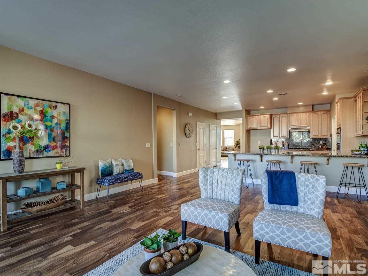 10803 Rushing Flume Drive Reno, NV 89521 - Photo 10 of 22 a living room with furniture and a wooden floor