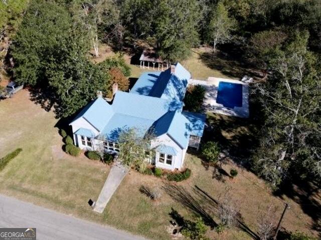 405 Monroe Street Garfield, GA 30425 - Photo 1 of 30 an aerial view of a house with a yard