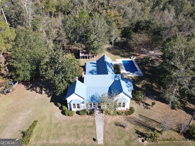 405 Monroe Street Garfield, GA 30425 - Photo 20 of 30 an aerial view of multiple houses with yard