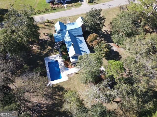 405 Monroe Street Garfield, GA 30425 - Photo 23 of 30 a view of a house with a yard