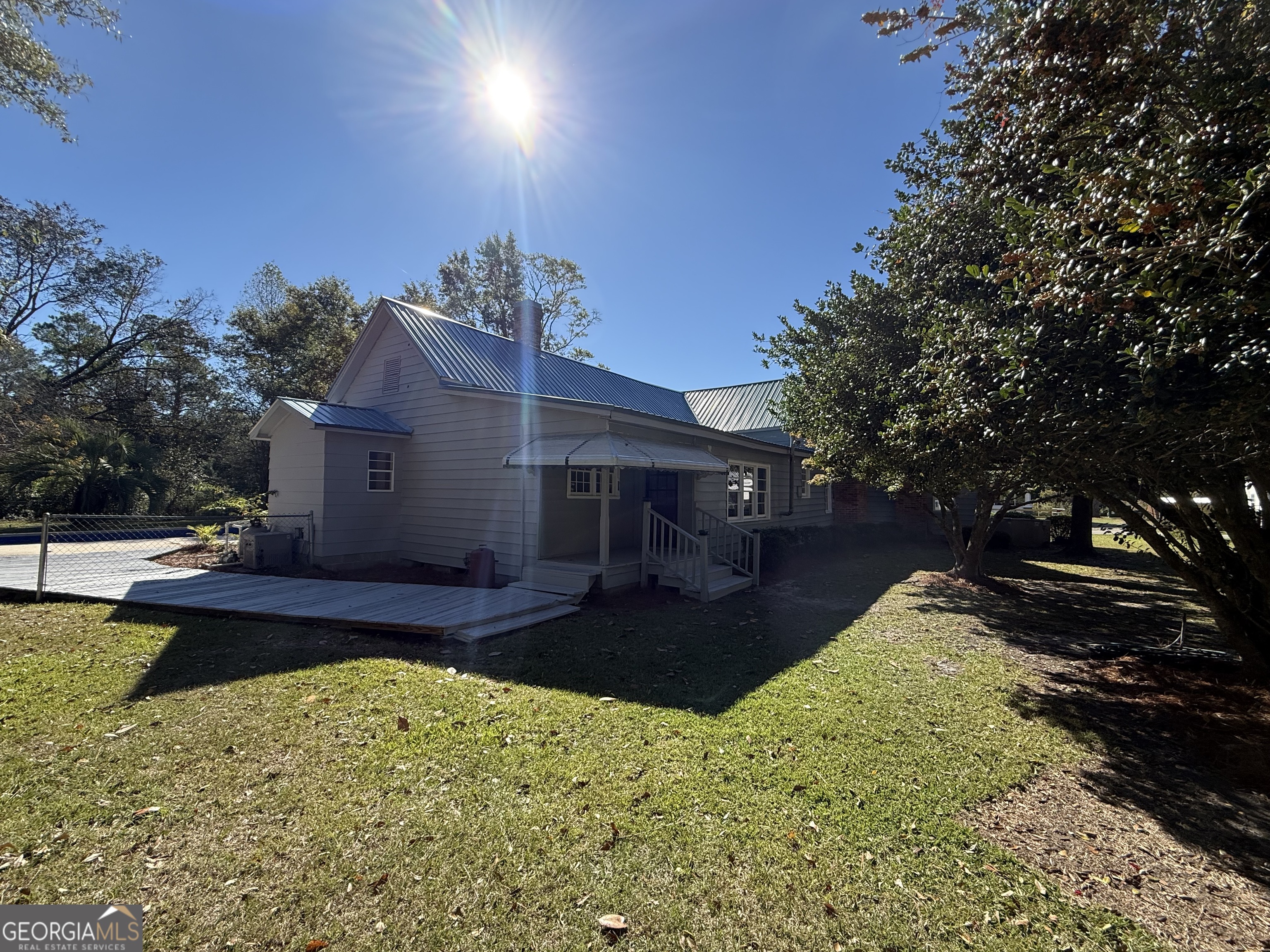 405 Monroe Street Garfield, GA 30425 - Photo 28 of 30 a front view of a house with a yard