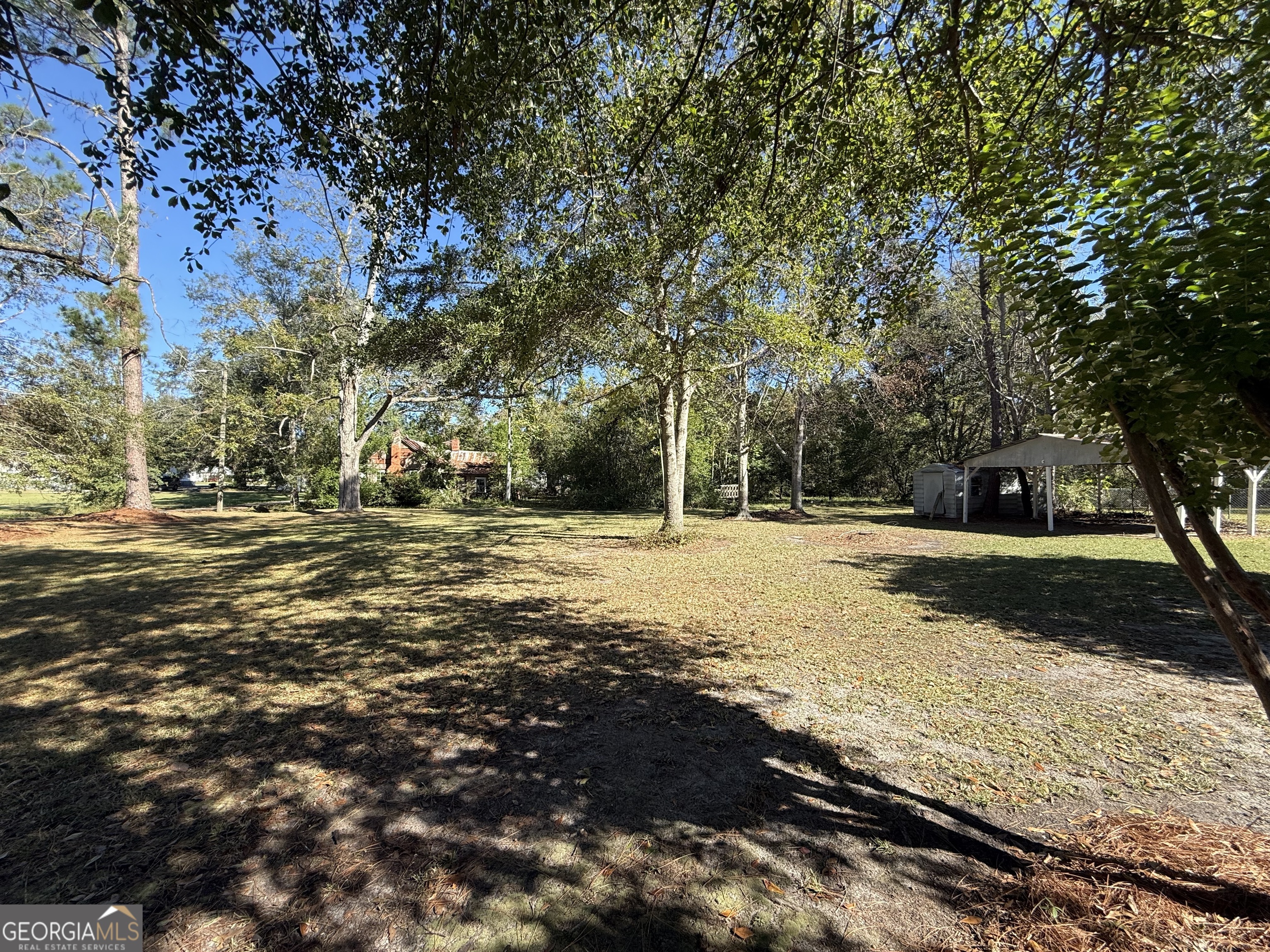 405 Monroe Street Garfield, GA 30425 - Photo 29 of 30 a view of road with large trees