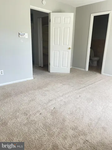 an empty room with closet