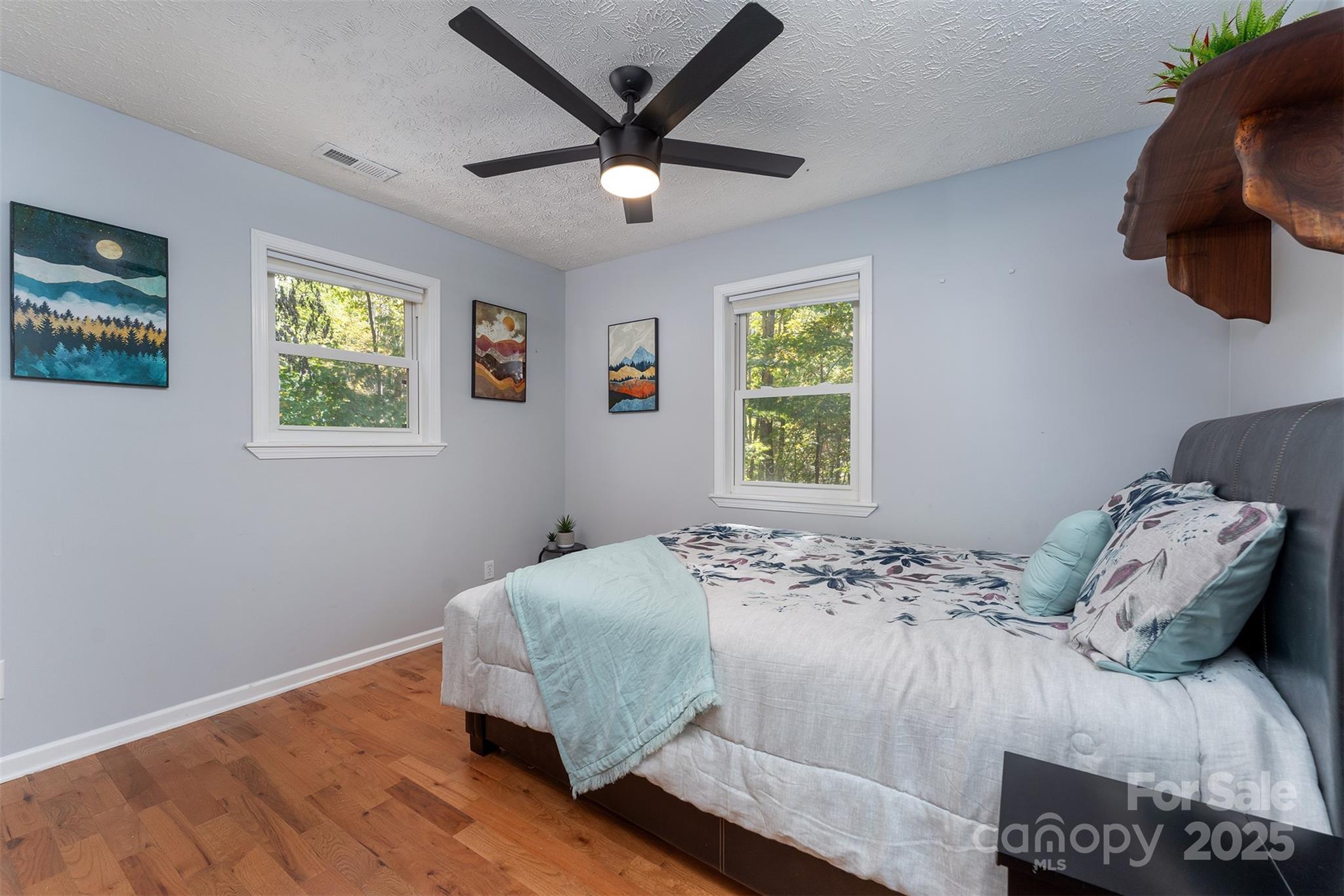 141 Willets Point Boulevard Nebo, NC 28761 - Photo 11 of 29 a bedroom with a bed and a window
