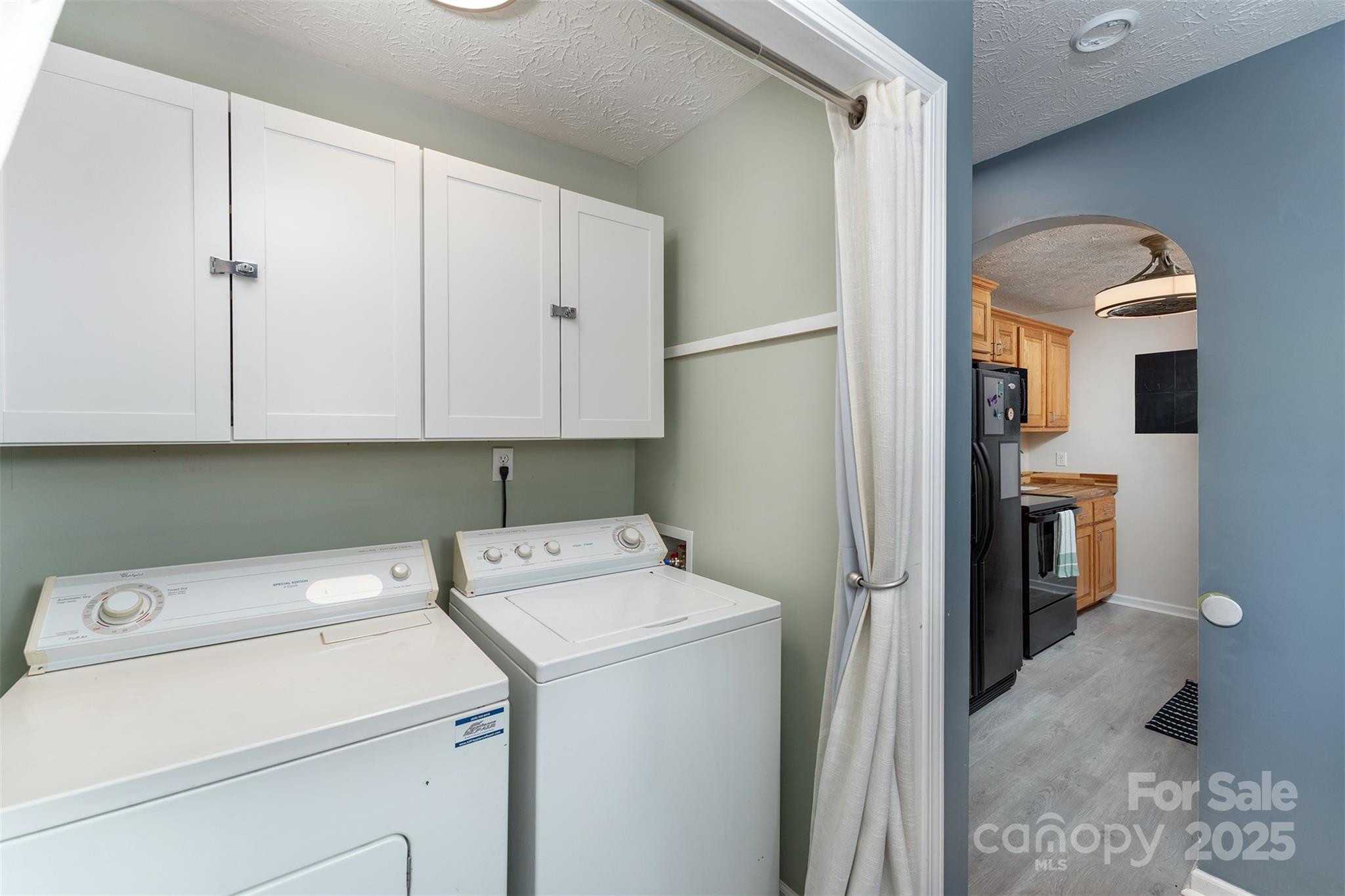 141 Willets Point Boulevard Nebo, NC 28761 - Photo 18 of 29 a view of storage and utility room with washer and dryer
