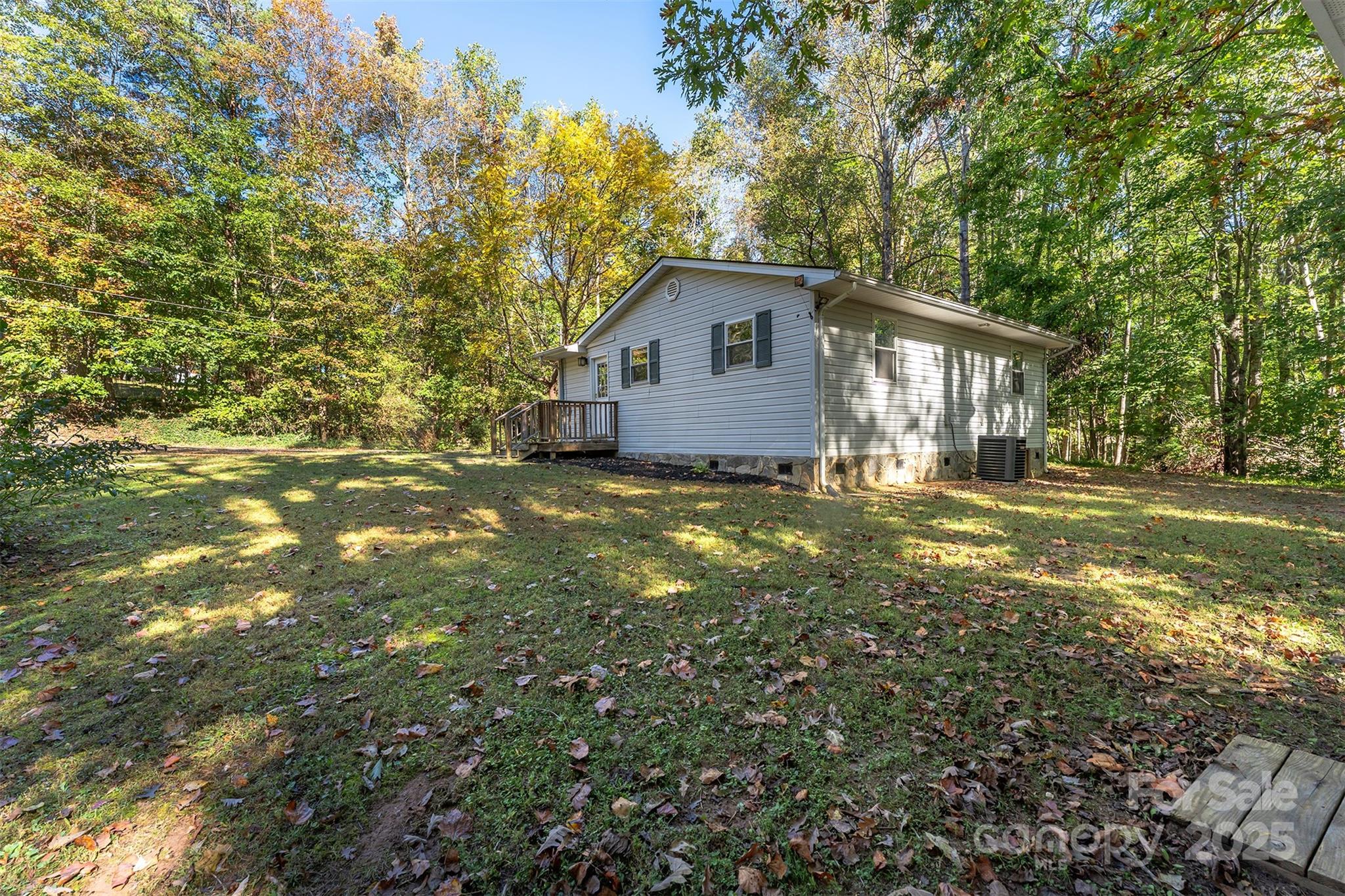 141 Willets Point Boulevard Nebo, NC 28761 - Photo 23 of 29 a view of a house with a tree in the yard