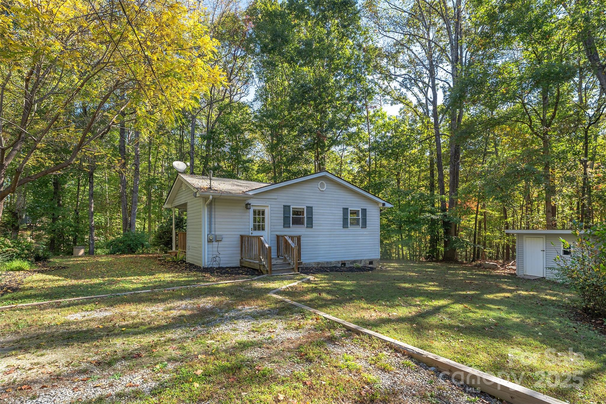 141 Willets Point Boulevard Nebo, NC 28761 - Photo 24 of 29 a house with a tree in front of it