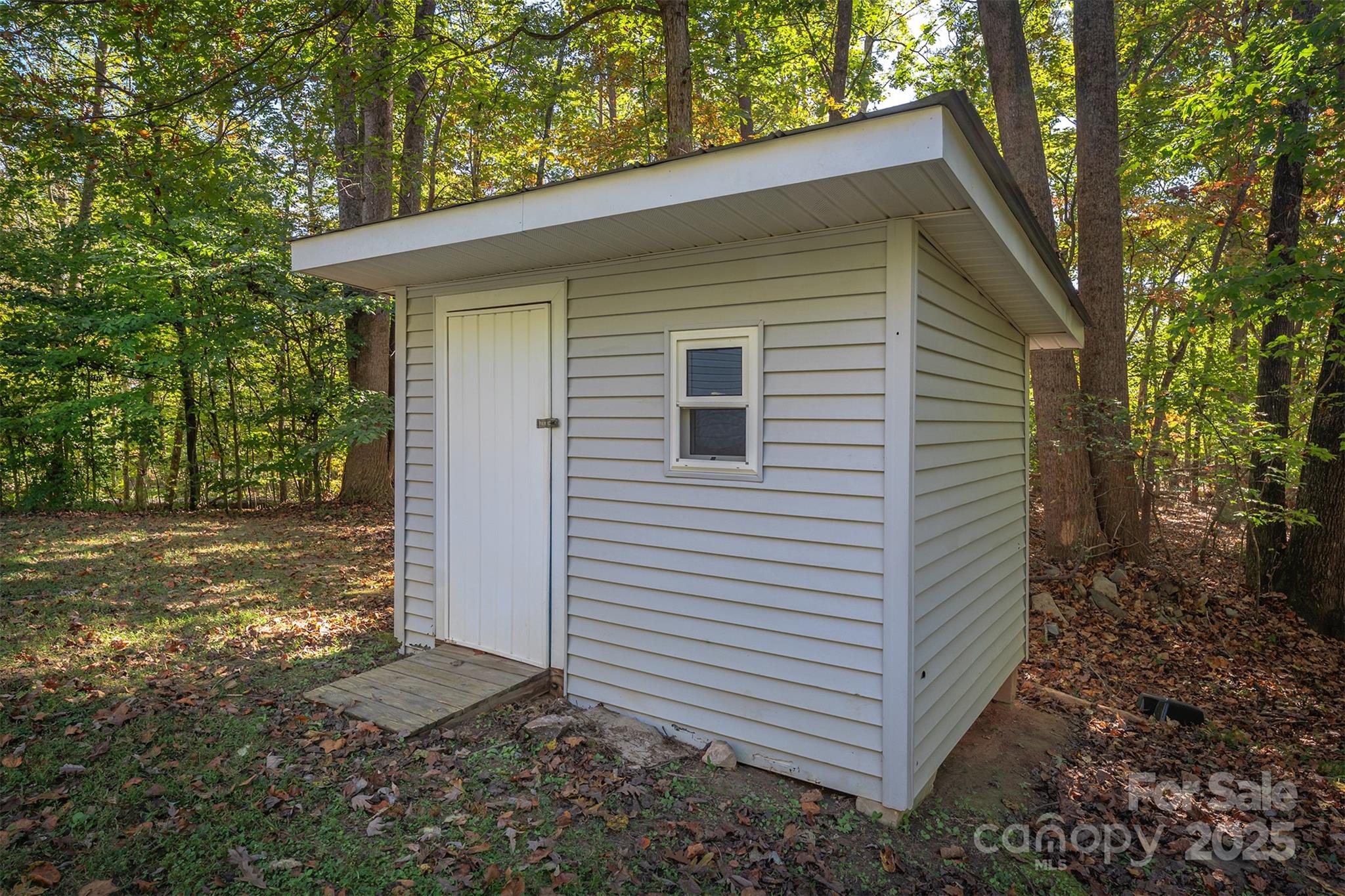 141 Willets Point Boulevard Nebo, NC 28761 - Photo 28 of 29 a view of a house with a yard
