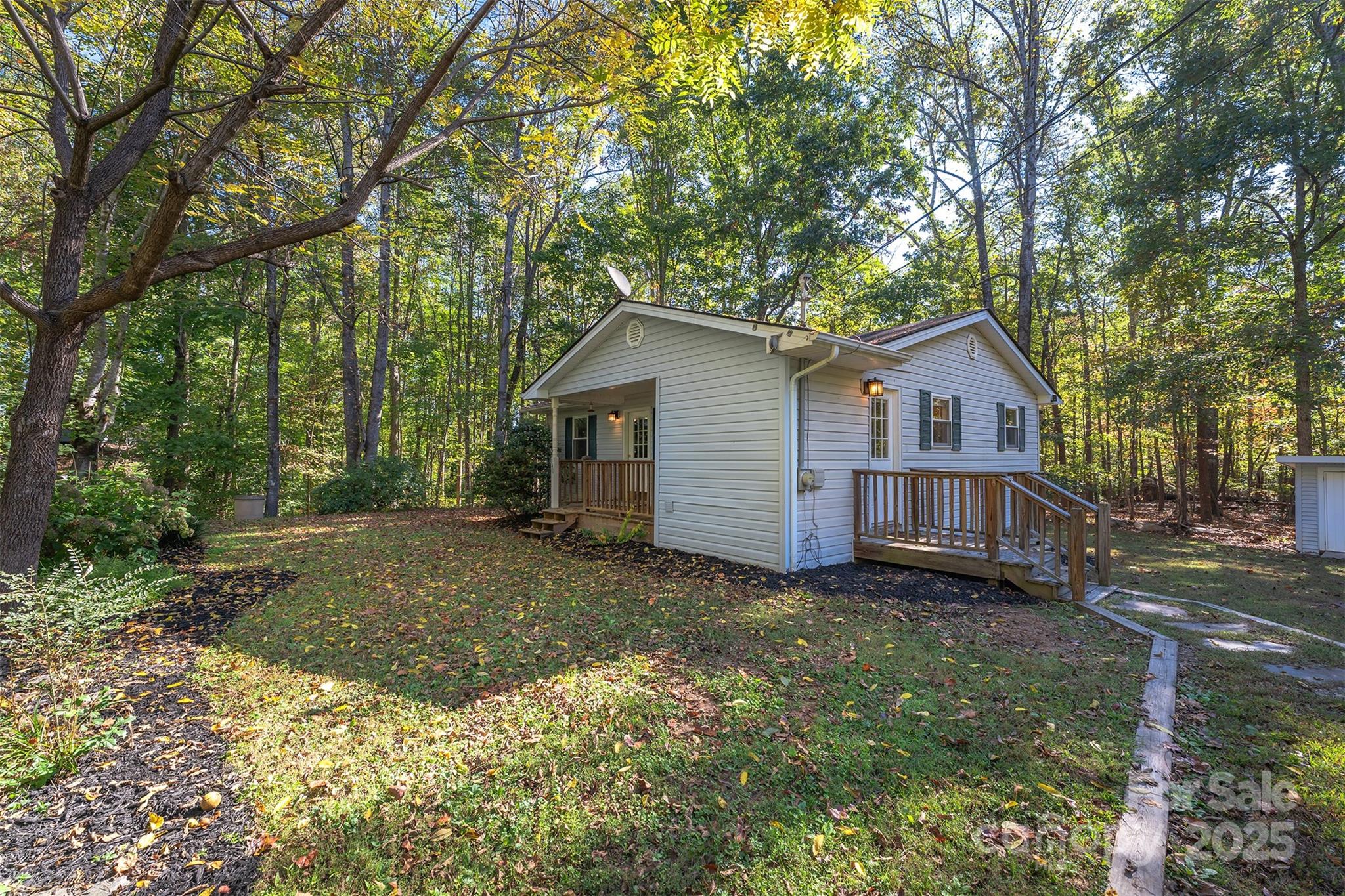 141 Willets Point Boulevard Nebo, NC 28761 - Photo 29 of 29 a view of a house with a yard