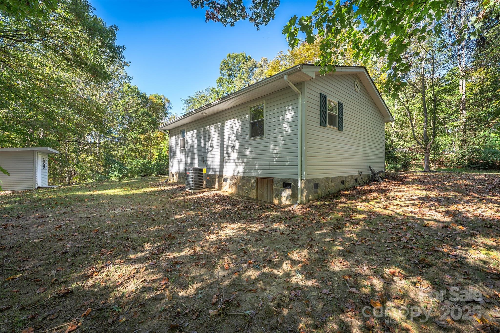 141 Willets Point Boulevard Nebo, NC 28761 - Photo 7 of 29 a view of a house with yard and a tree