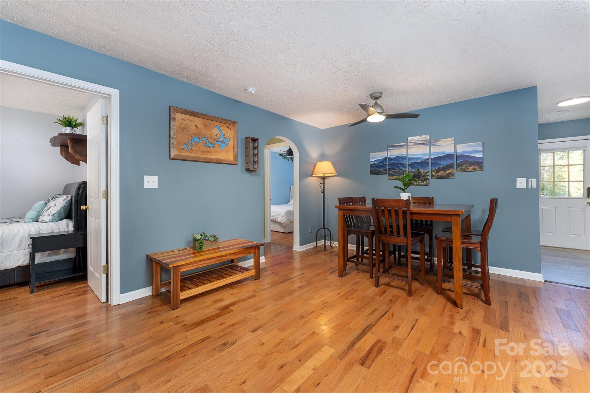 141 Willets Point Boulevard Nebo, NC 28761 - Photo 9 of 29 a living room with furniture and a wooden floor