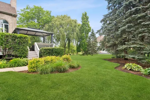 a view of a house with a garden