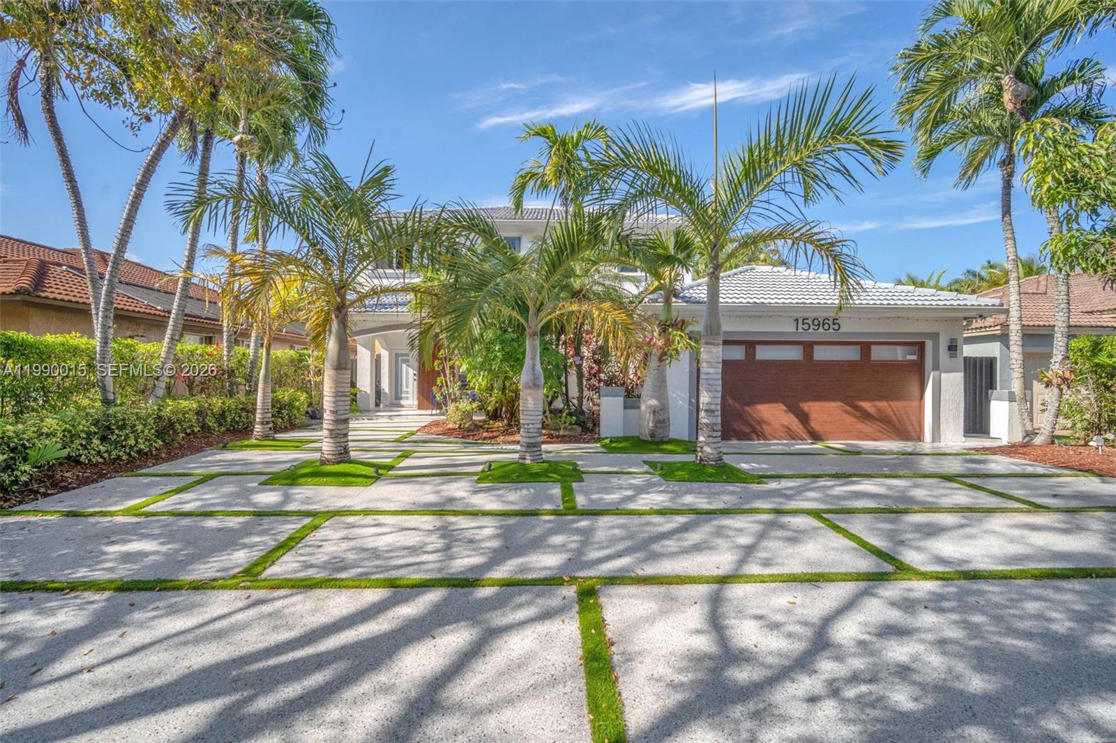 15965 Southwest 98th Street Miami, FL 33196 - Photo 4 of 53 Plenty of parking on new epoxy driveway