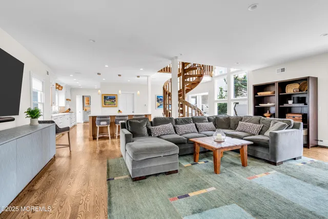a bathroom with a shower and a sink