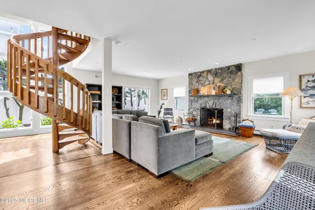 a kitchen with stainless steel appliances granite countertop a sink and cabinets