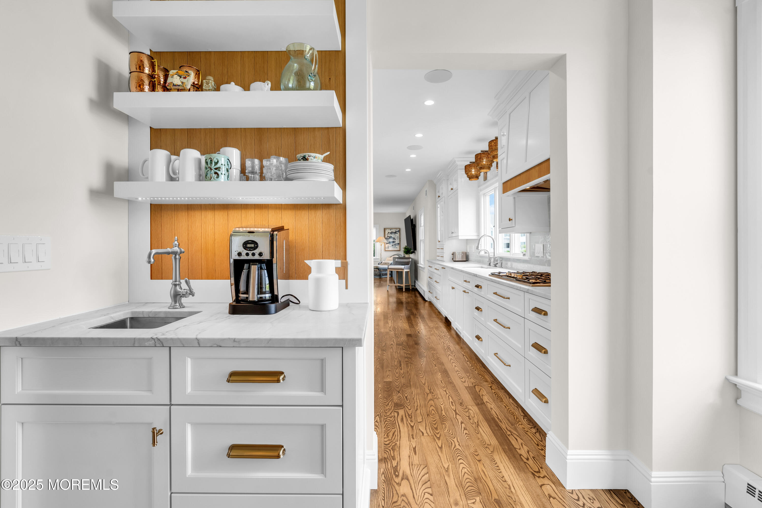 1612 Ocean Avenue Spring Lake, NJ 07762 - Photo 25 of 61 a kitchen with stainless steel appliances granite countertop a sink and cabinets
