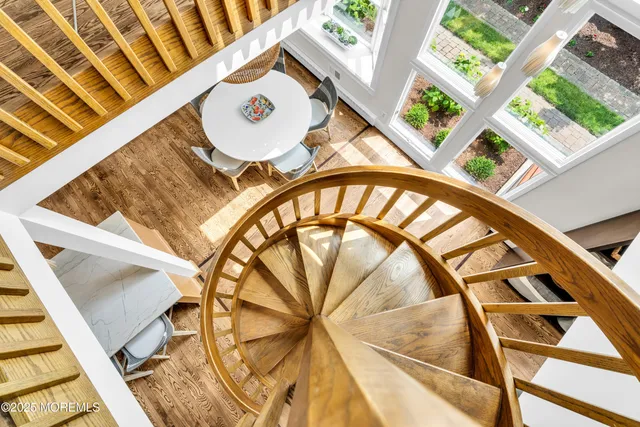 a bathroom with a shower and a sink