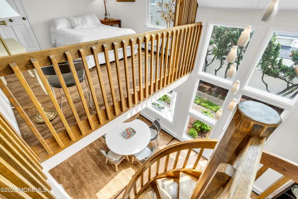 a bedroom with a bed and a fireplace