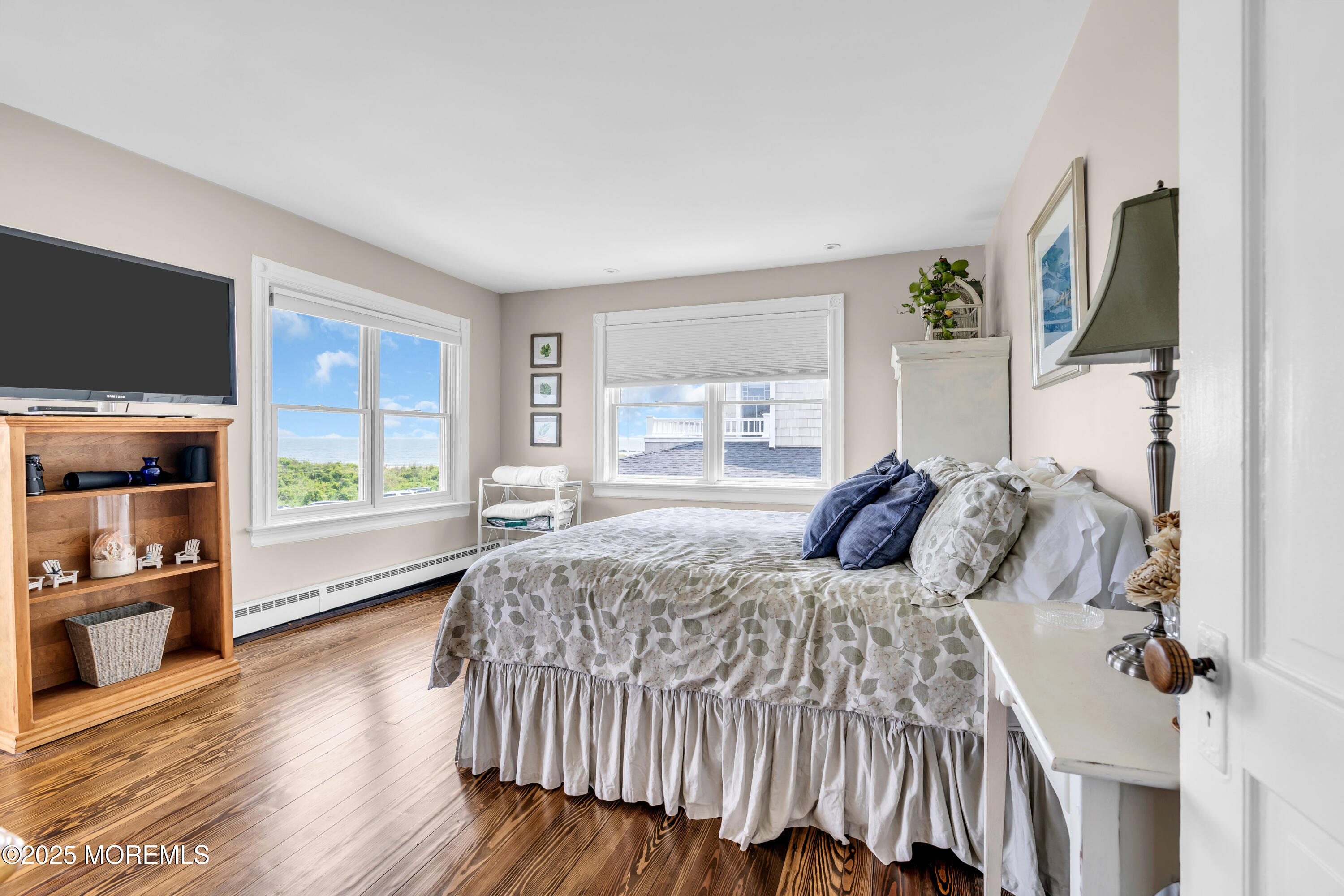 1612 Ocean Avenue Spring Lake, NJ 07762 - Photo 34 of 61 a bedroom with a large bed and a window