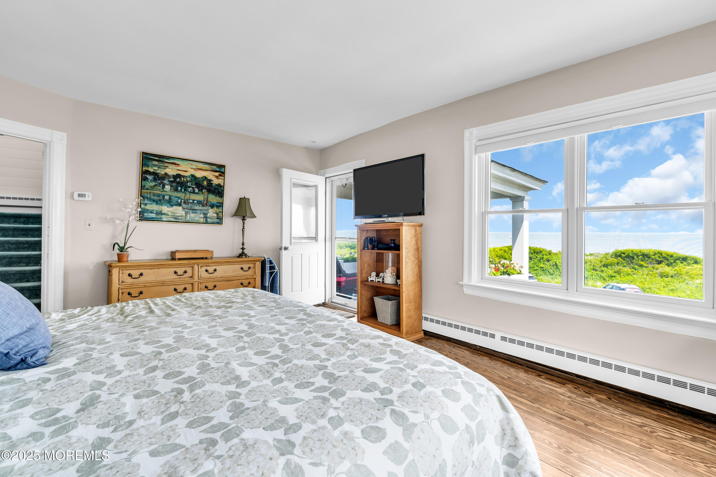 1612 Ocean Avenue Spring Lake, NJ 07762 - Photo 35 of 61 a bed room with a bed and a television