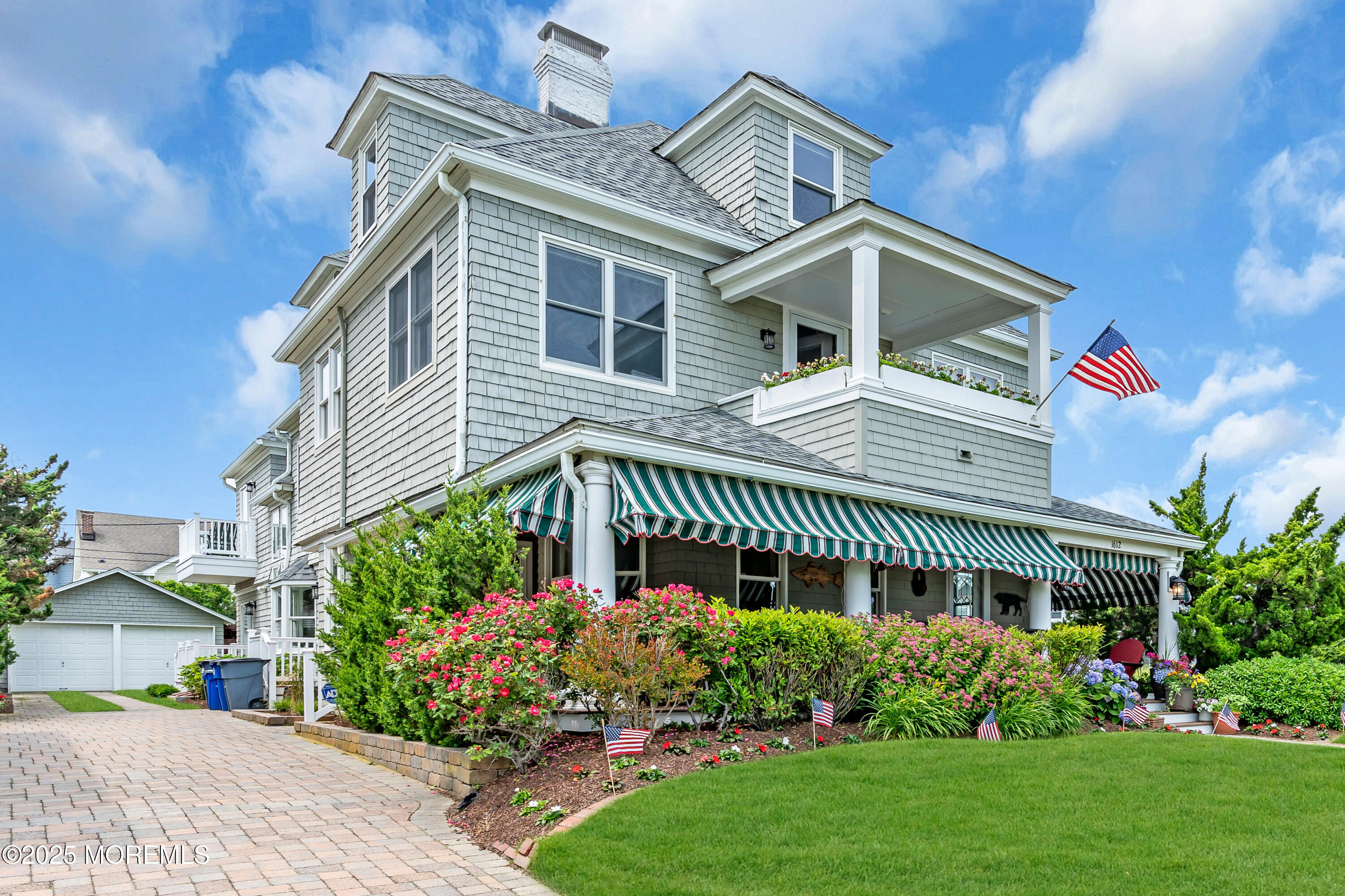 1612 Ocean Avenue Spring Lake, NJ 07762 - Photo 40 of 61 a front view of a house with a yard