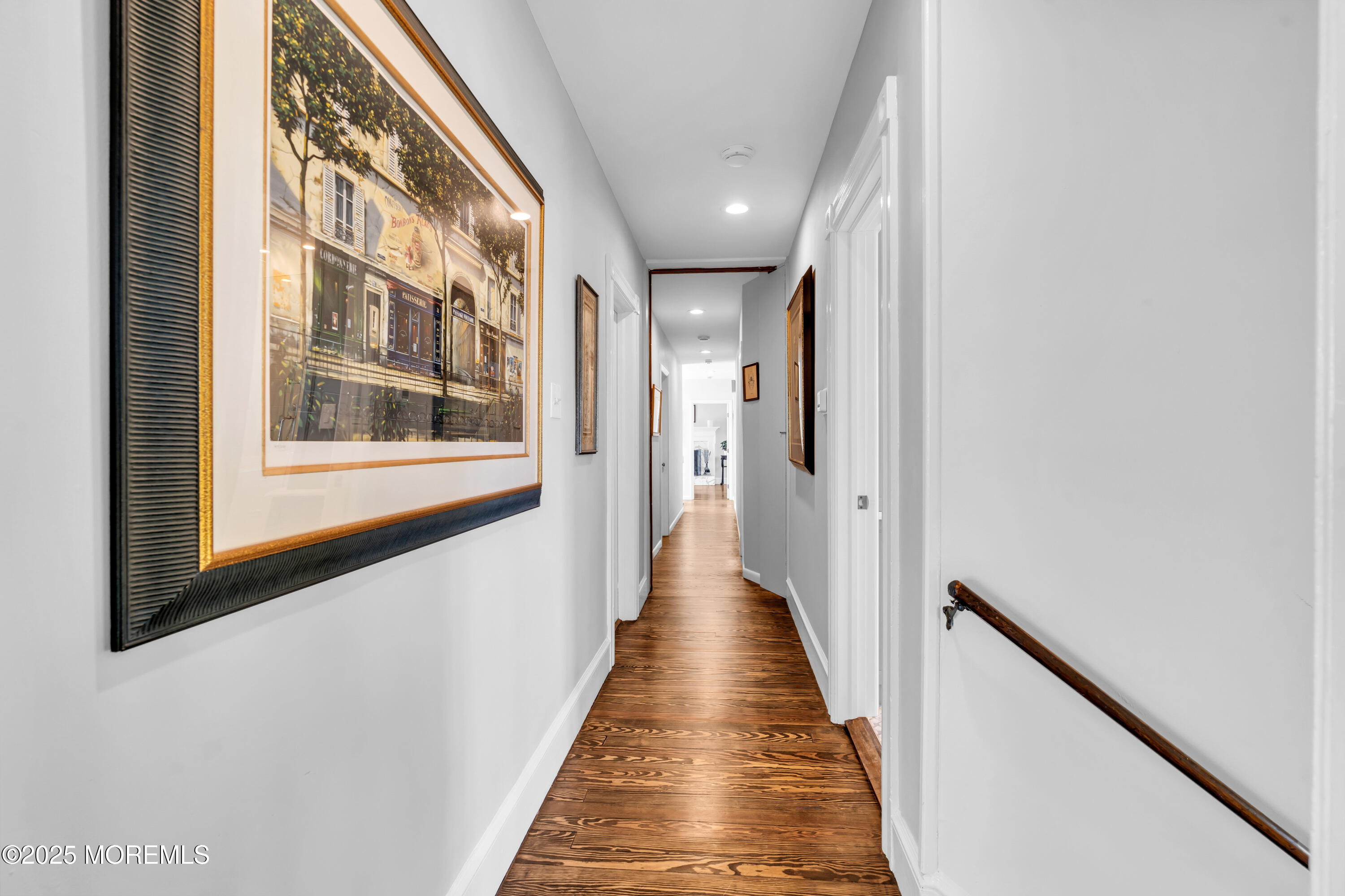 1612 Ocean Avenue Spring Lake, NJ 07762 - Photo 45 of 61 a view of a hallway with wooden floor and staircase