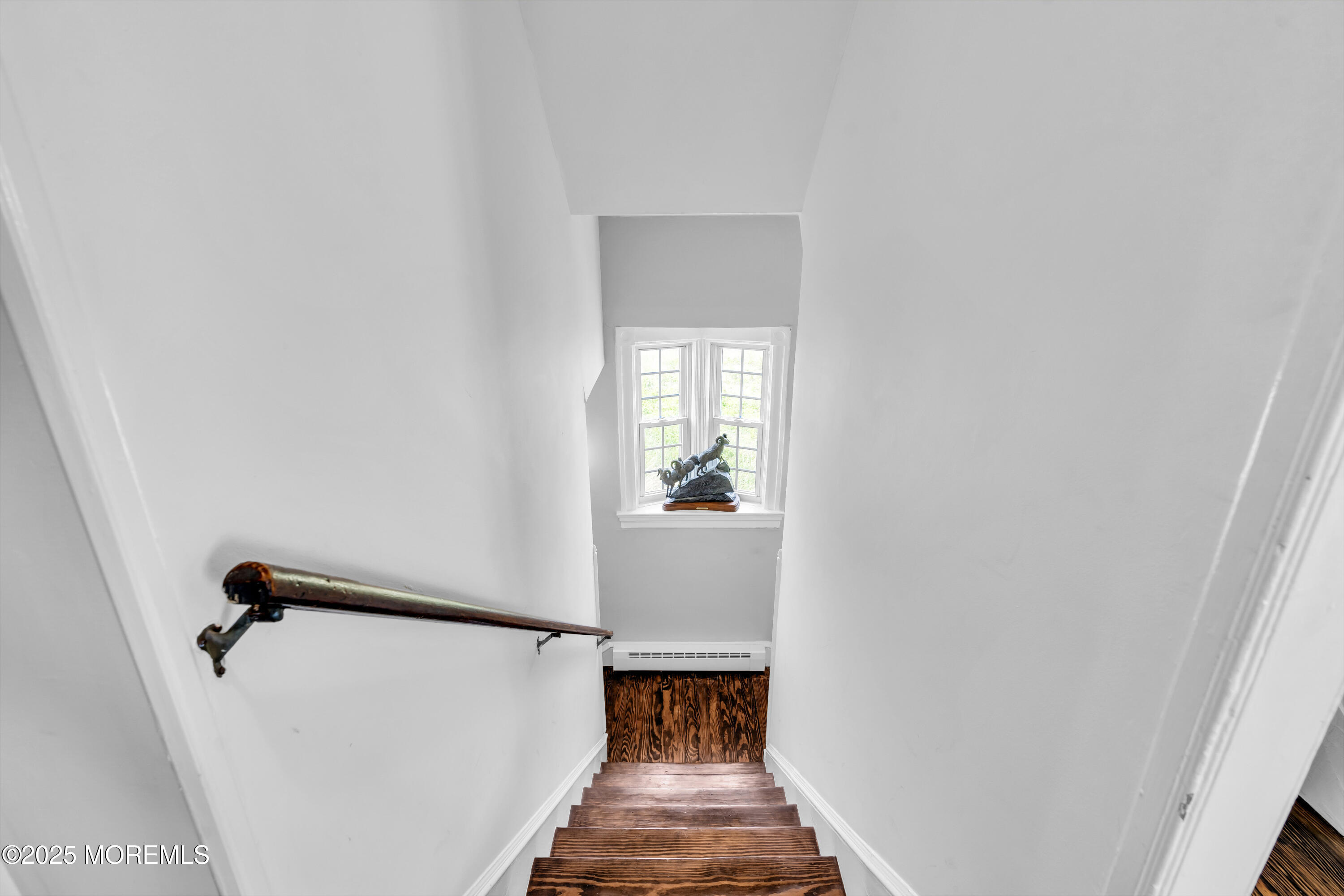 1612 Ocean Avenue Spring Lake, NJ 07762 - Photo 47 of 61 a view of a hallway with wooden floor