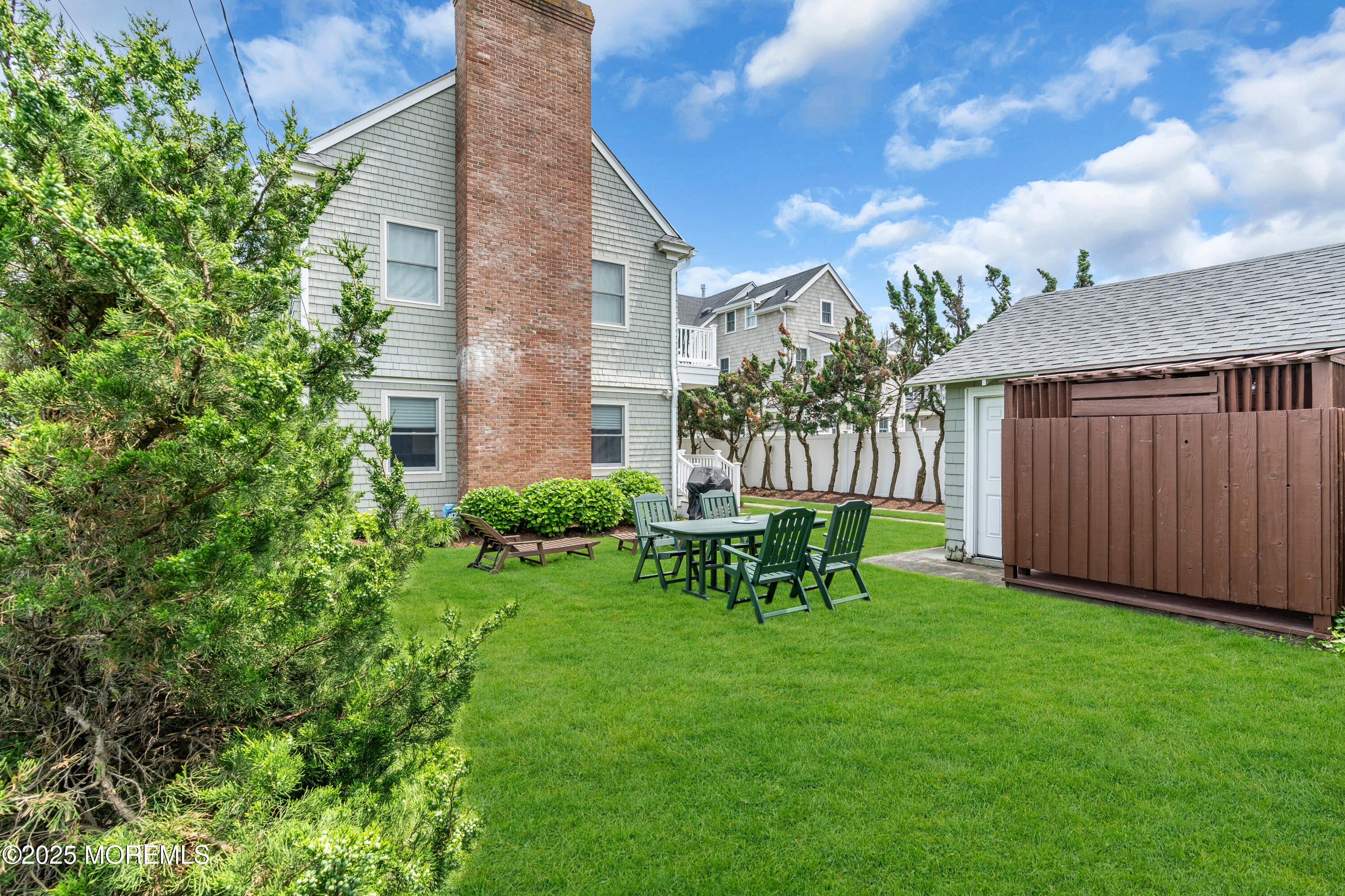 1612 Ocean Avenue Spring Lake, NJ 07762 - Photo 52 of 61 a view of an house with backyard space and sitting area
